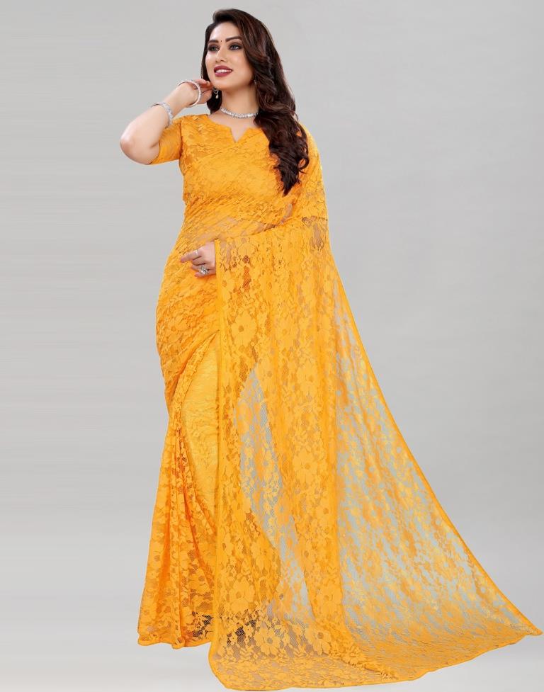 Turmeric Yellow Coloured Russel Net Partywear saree | Sudathi