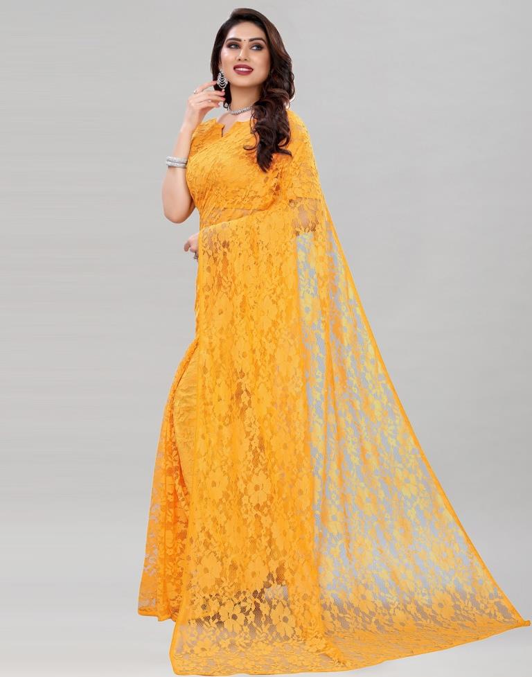Turmeric Yellow Coloured Russel Net Partywear saree | Sudathi