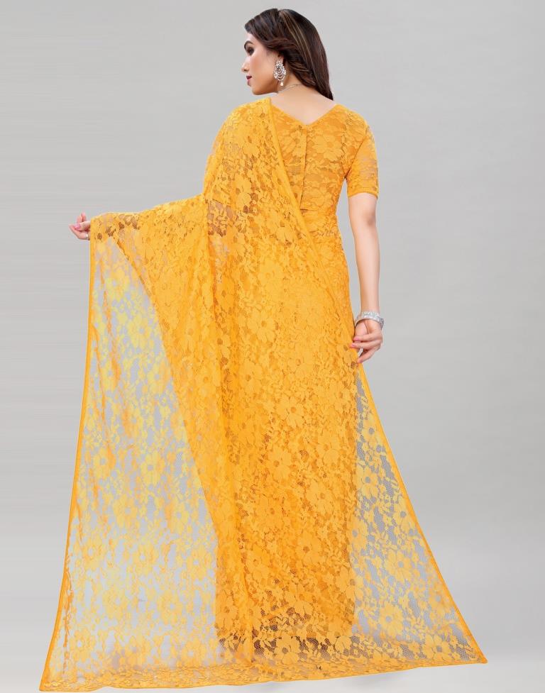 Turmeric Yellow Coloured Russel Net Partywear saree | Sudathi