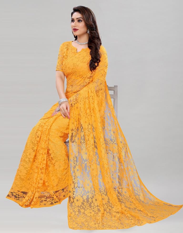Turmeric Yellow Coloured Russel Net Partywear saree | Sudathi