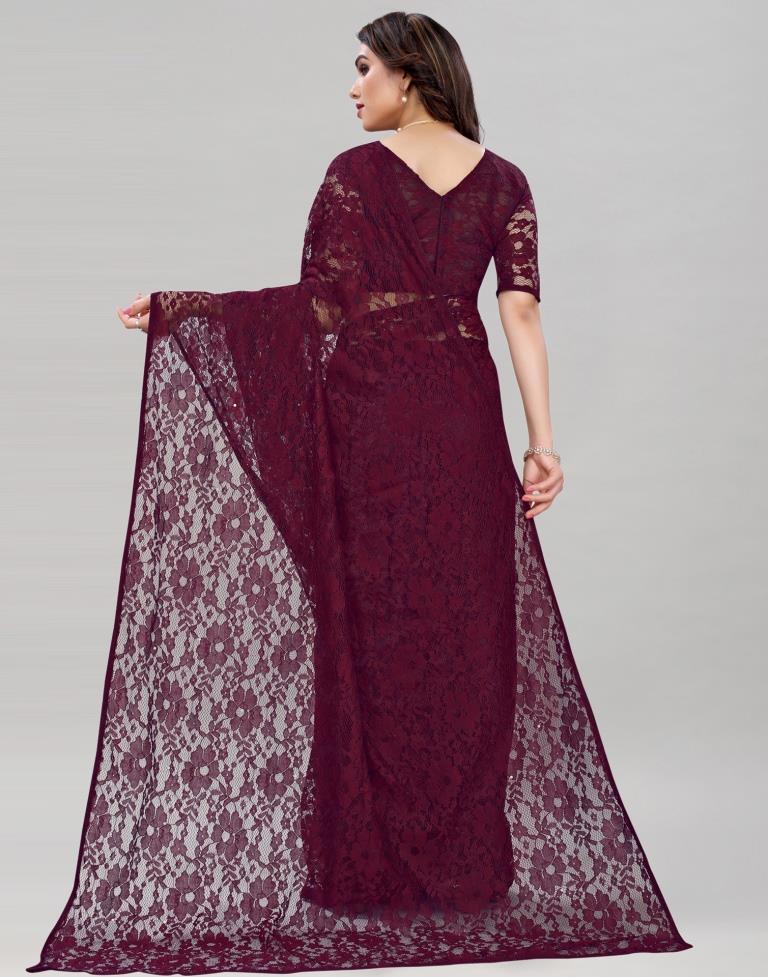 Wine Coloured Russel Net Partywear saree | Sudathi