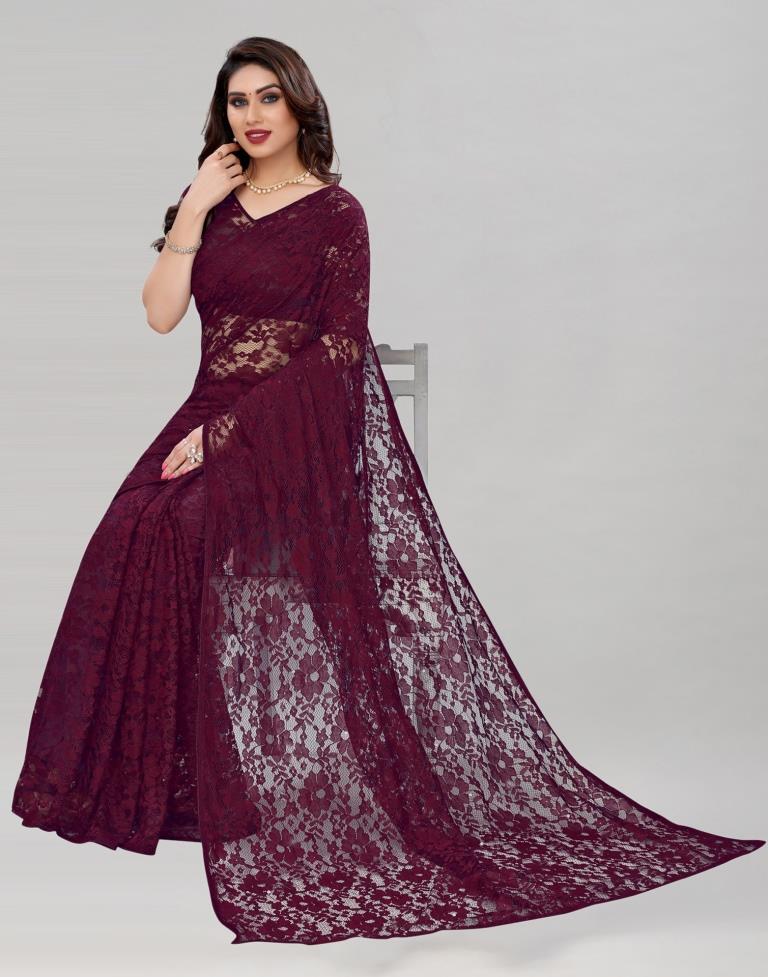 Wine Coloured Russel Net Partywear saree | Sudathi