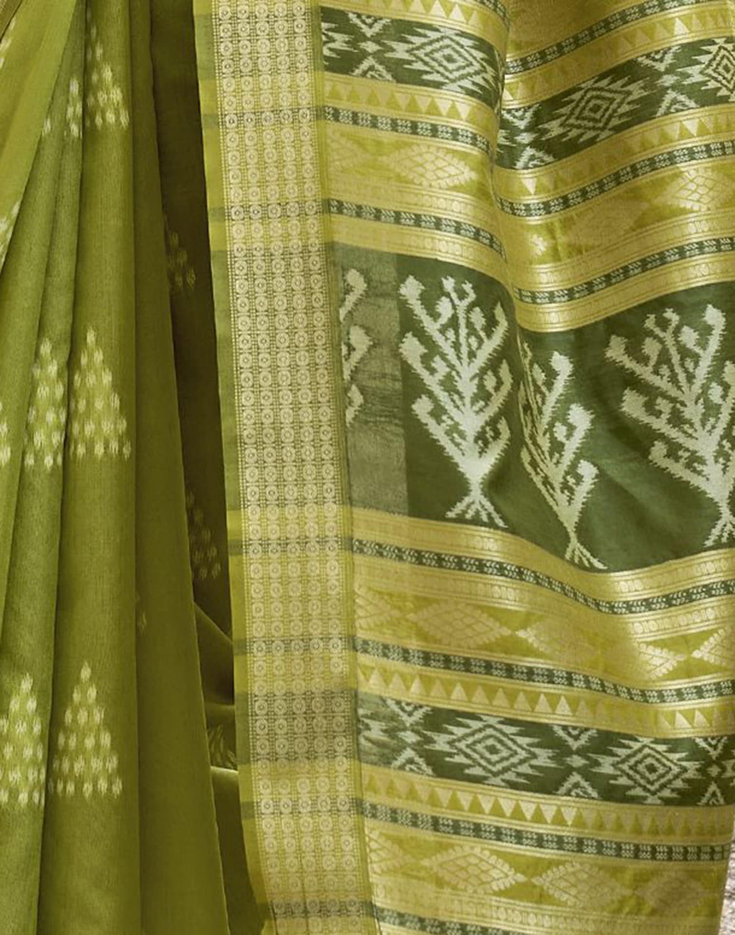 Parrot Green Silk Ikkat Woven Saree