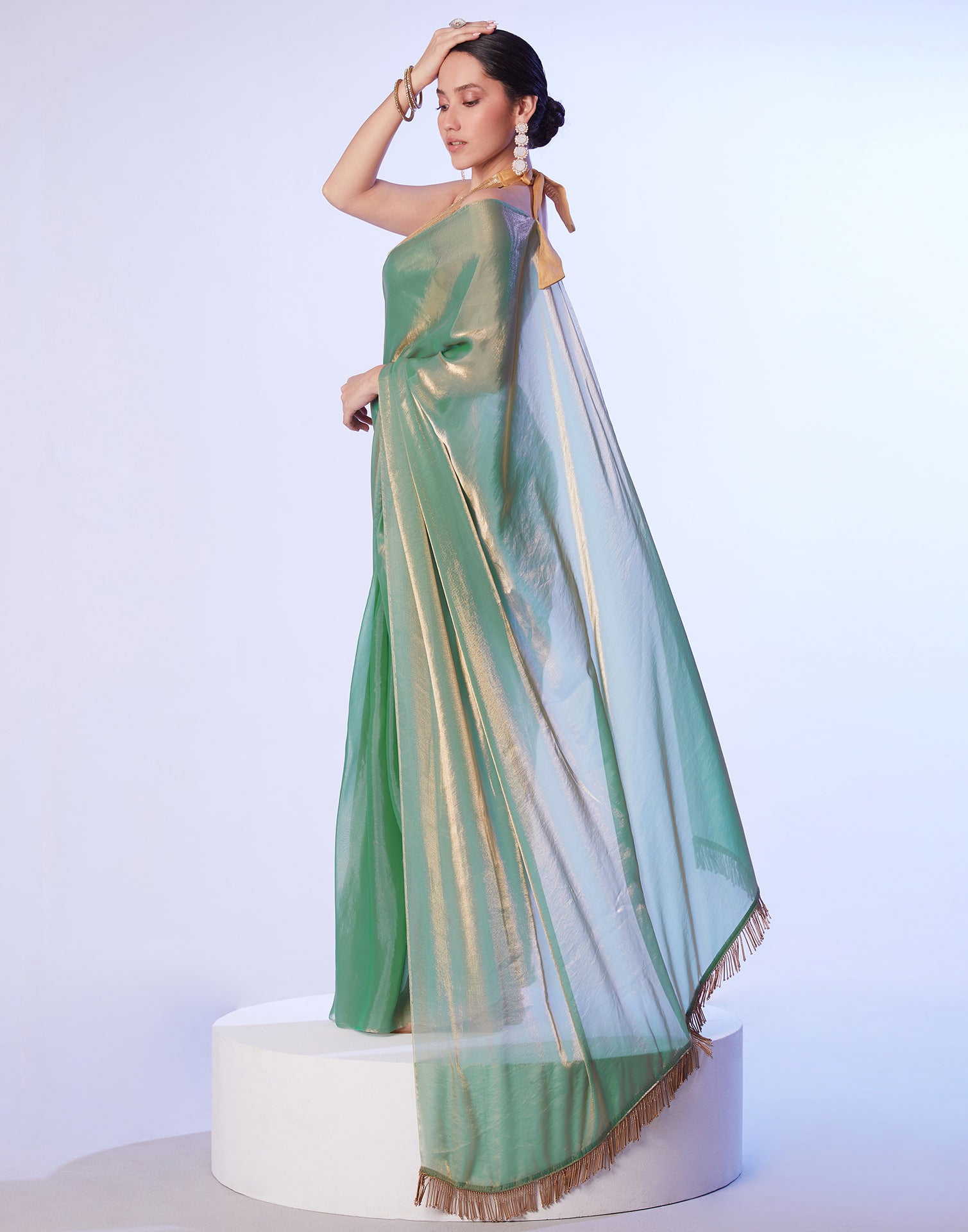 Green Tissue Silk Dyed Solid Saree