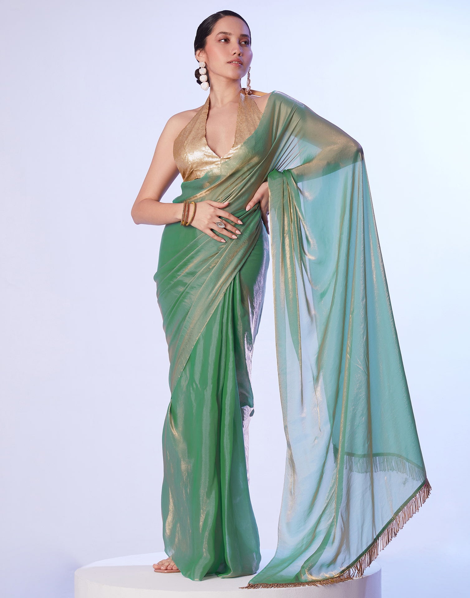 Green Tissue Silk Dyed Solid Saree