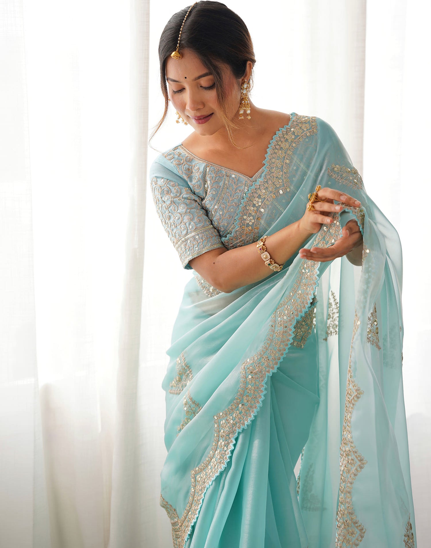 Sky Blue Organza Dyed Embellished Saree
