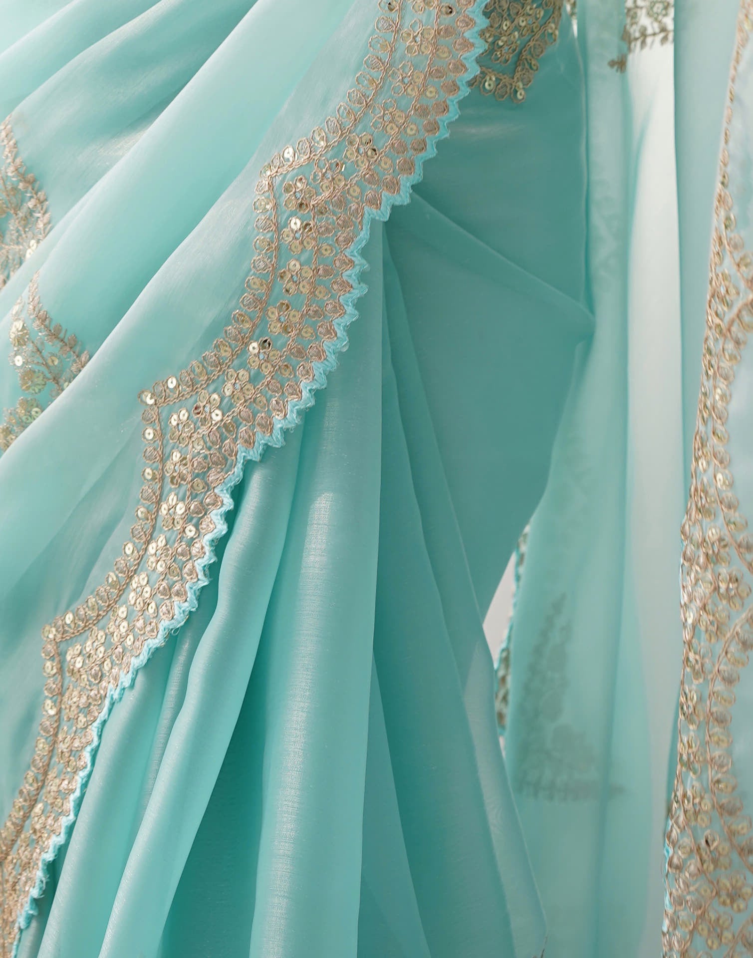 Sky Blue Organza Dyed Embellished Saree