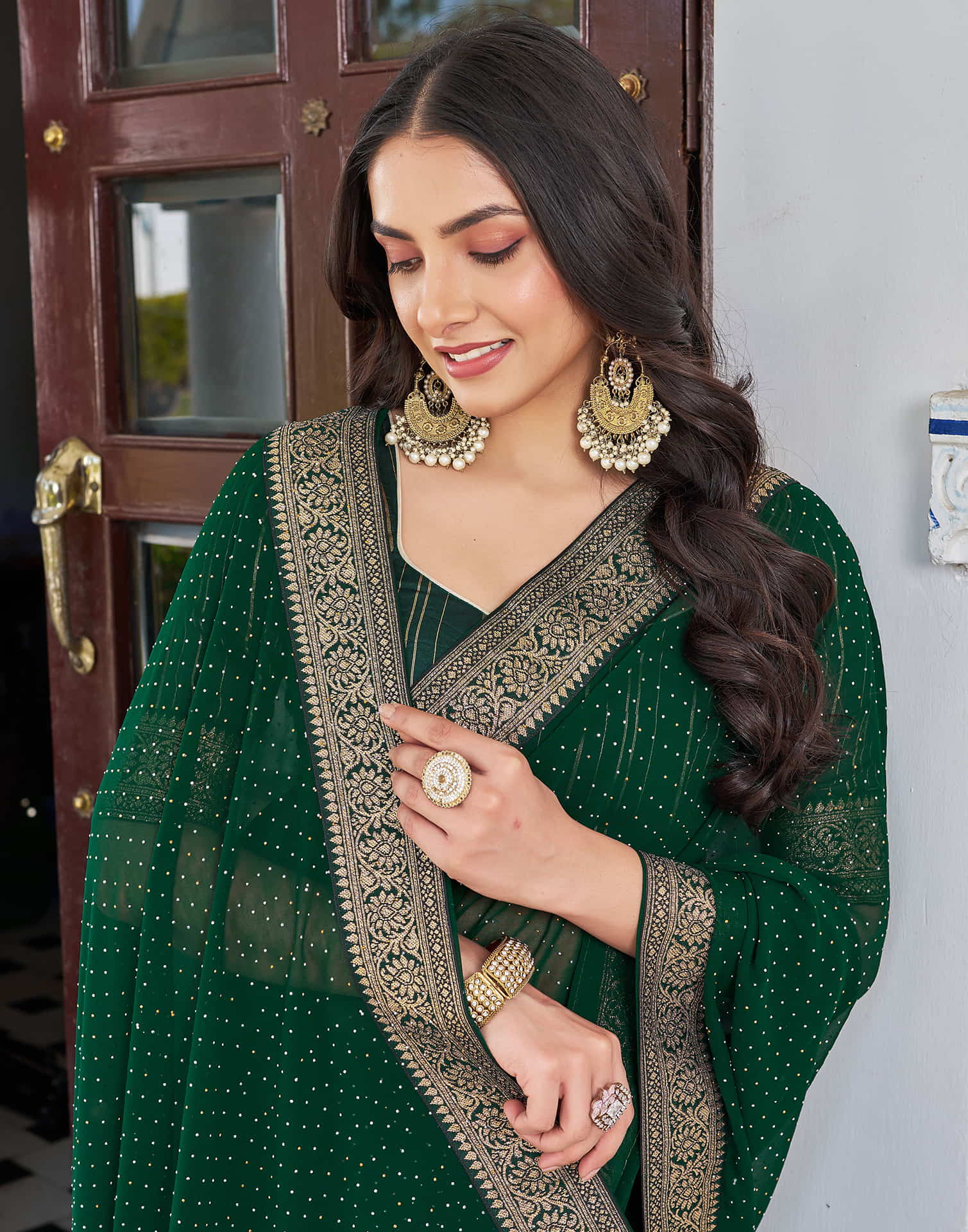 Dark Green Georgette Stone Work Embellished Saree