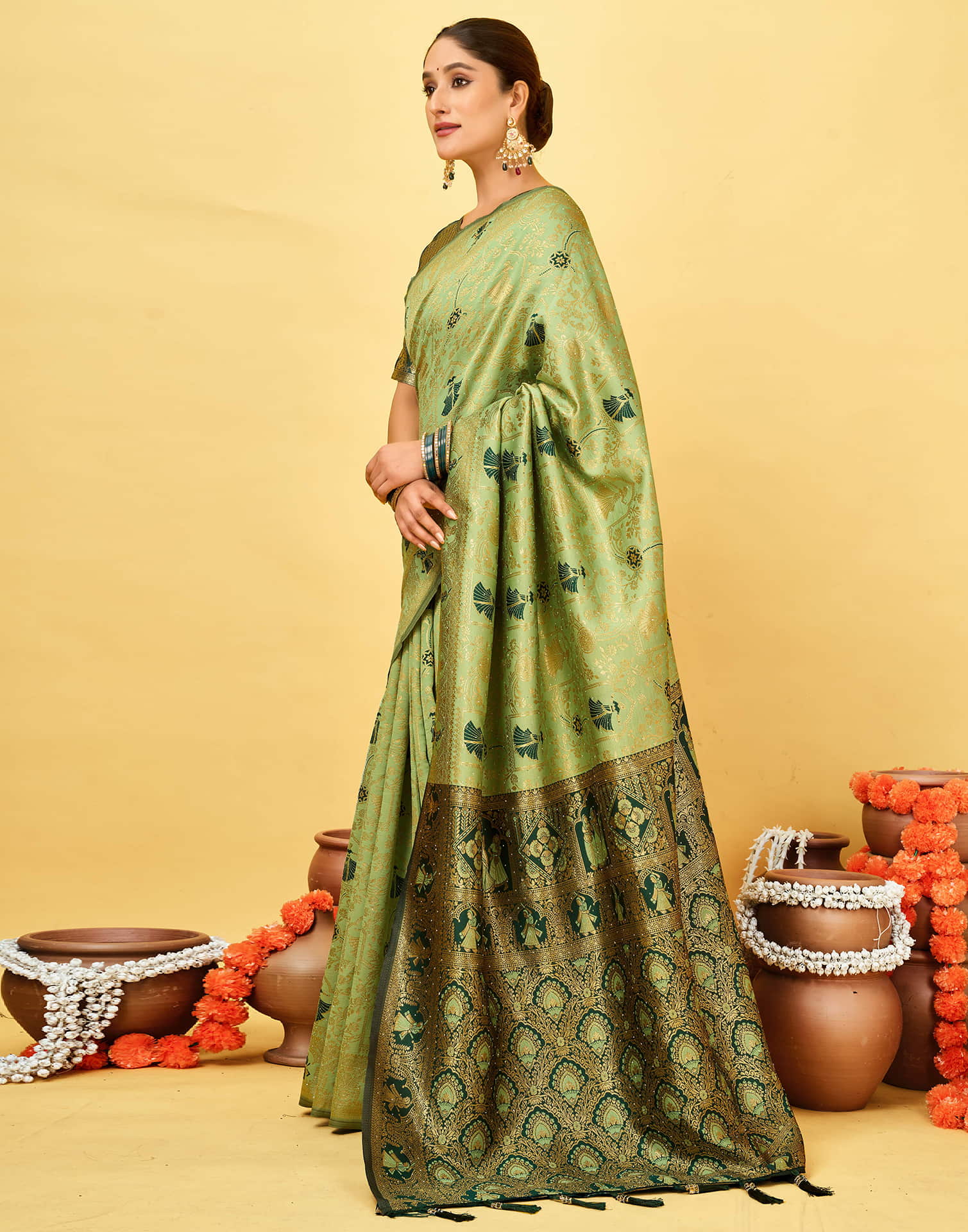 Pista Green Silk Woven Baluchari Saree