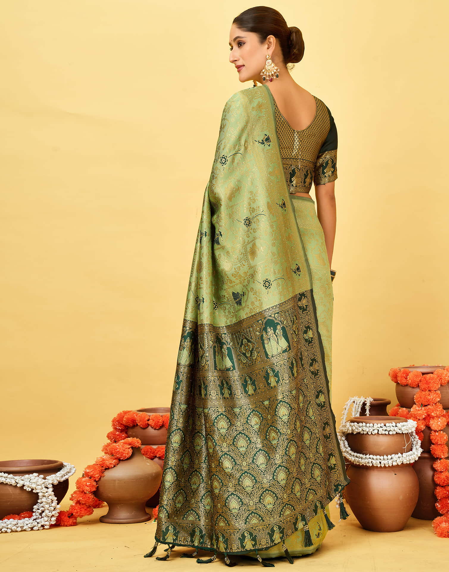 Pista Green Silk Woven Baluchari Saree