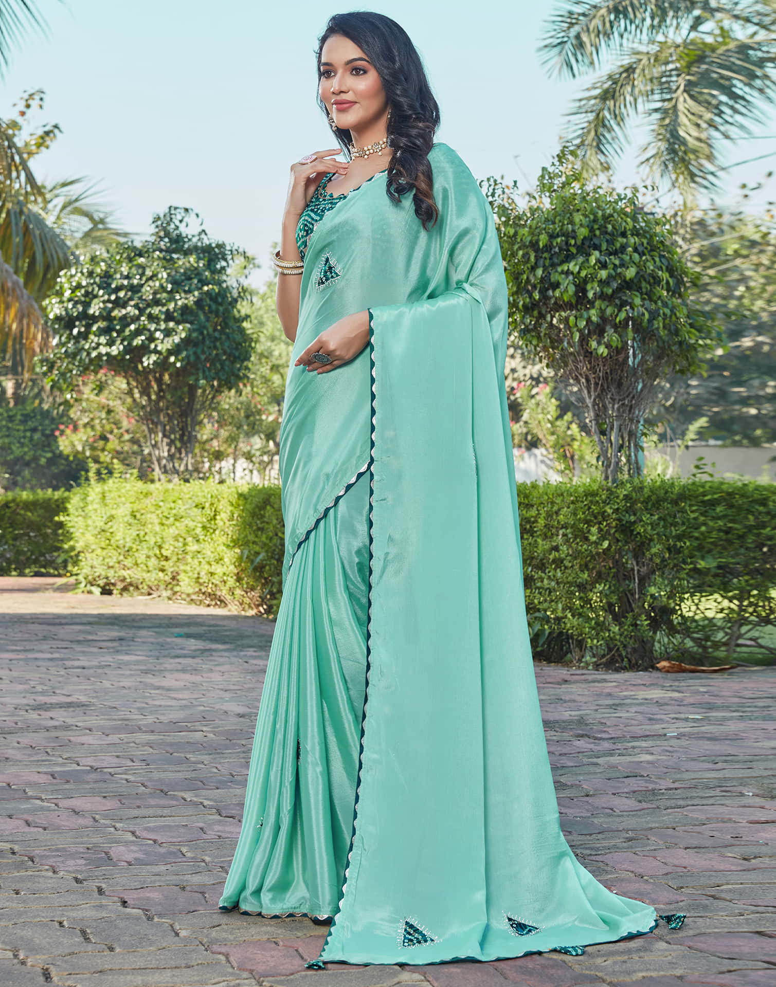 Pale Teal Green Chinnon Patch Work Embellished Saree