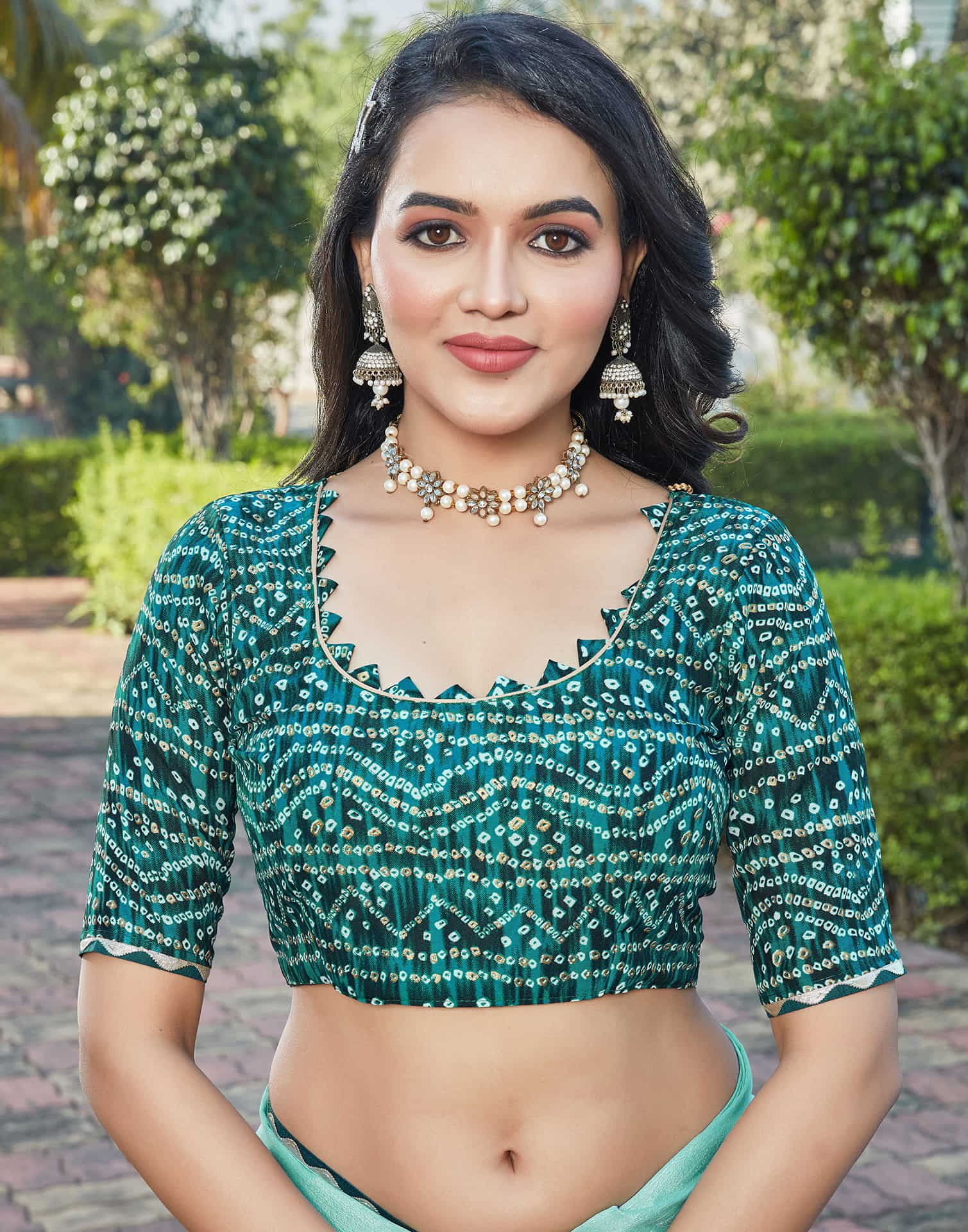 Pale Teal Green Chinnon Patch Work Embellished Saree