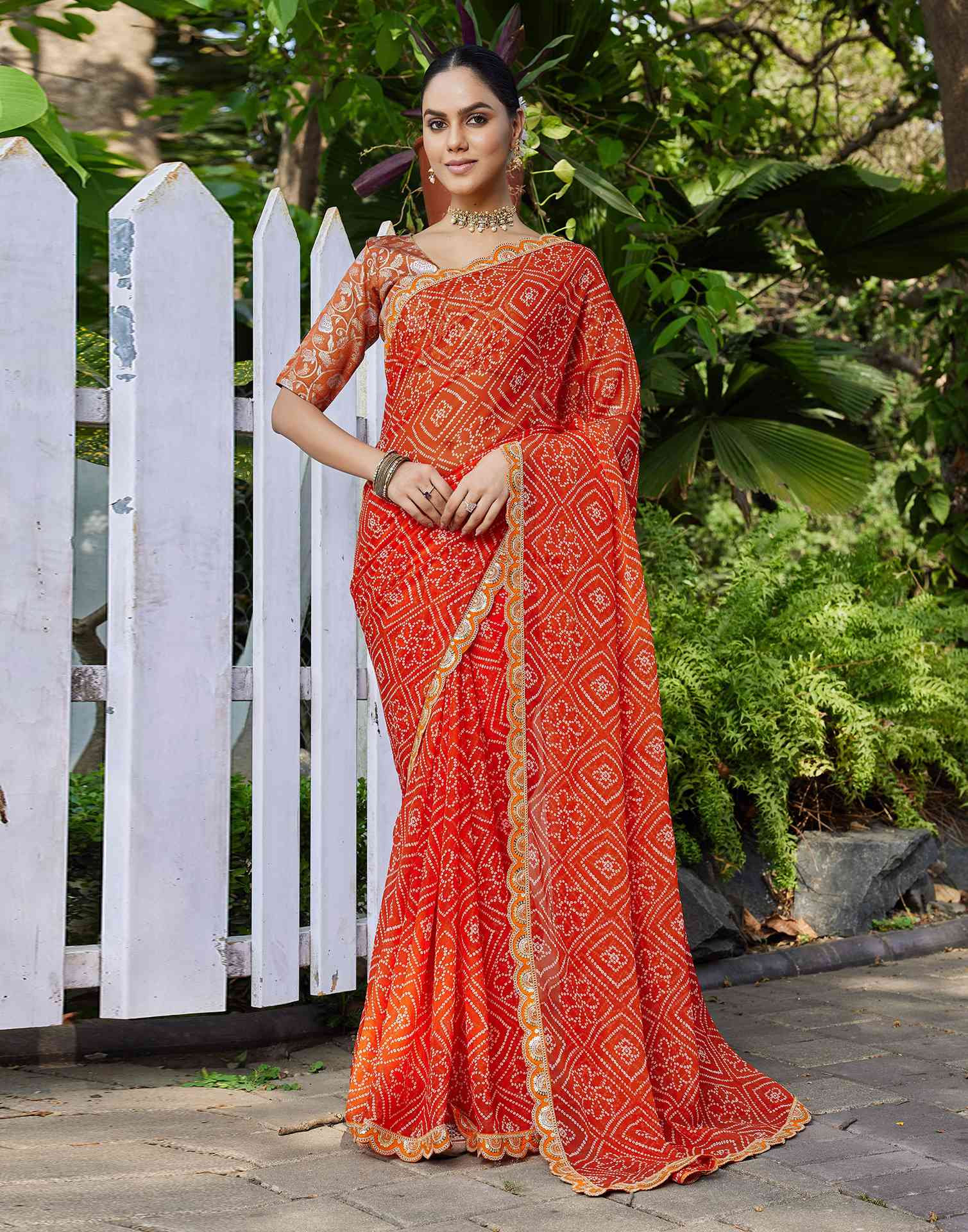 Orange Georgette Bandhani Printed Saree