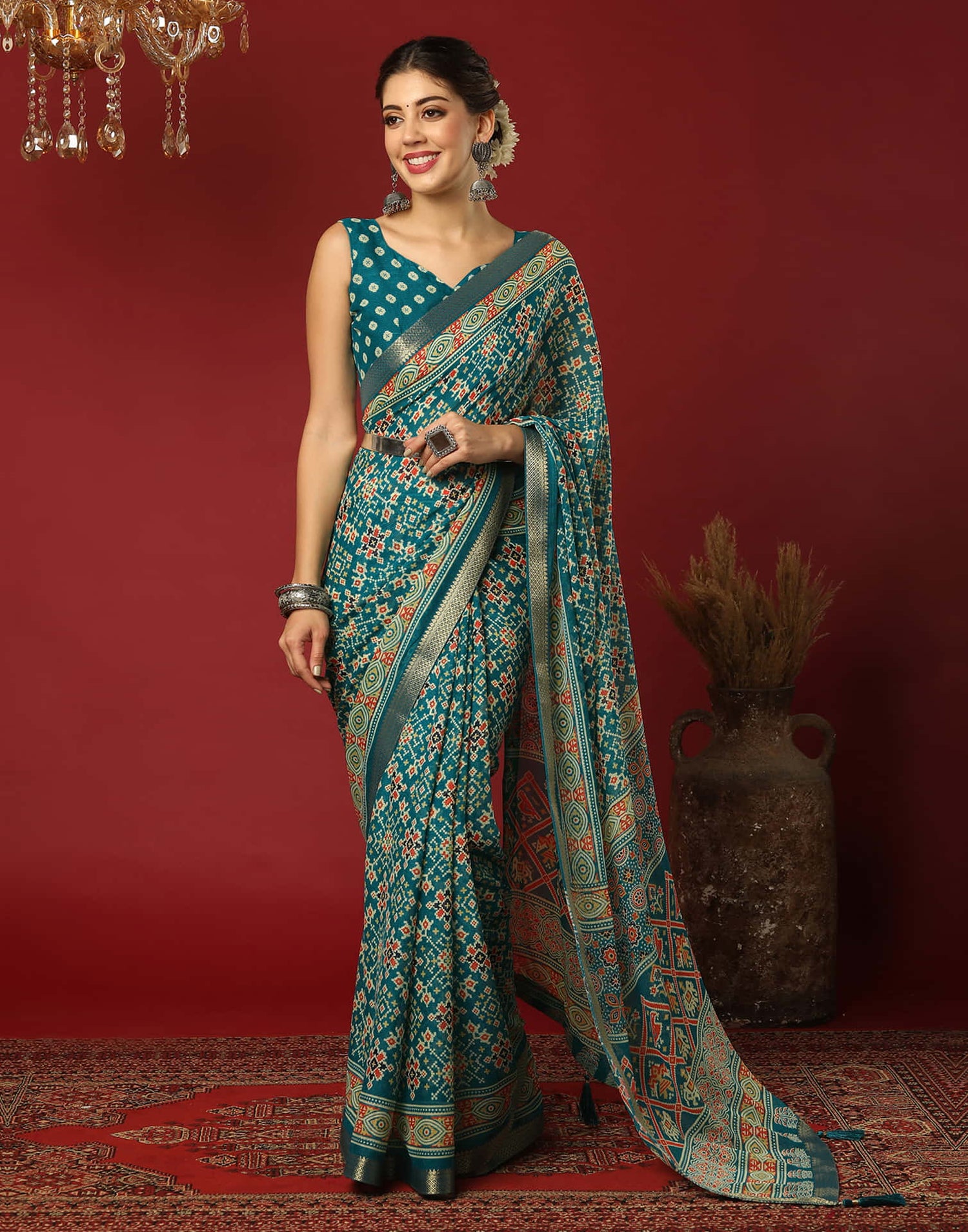 Teal Green Georgette Printed Patola Saree