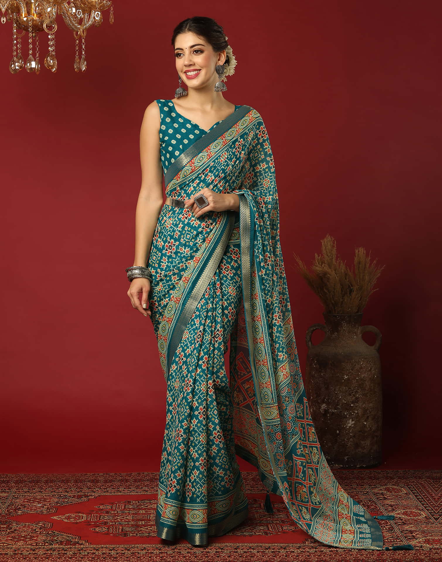 Teal Green Georgette Printed Patola Saree