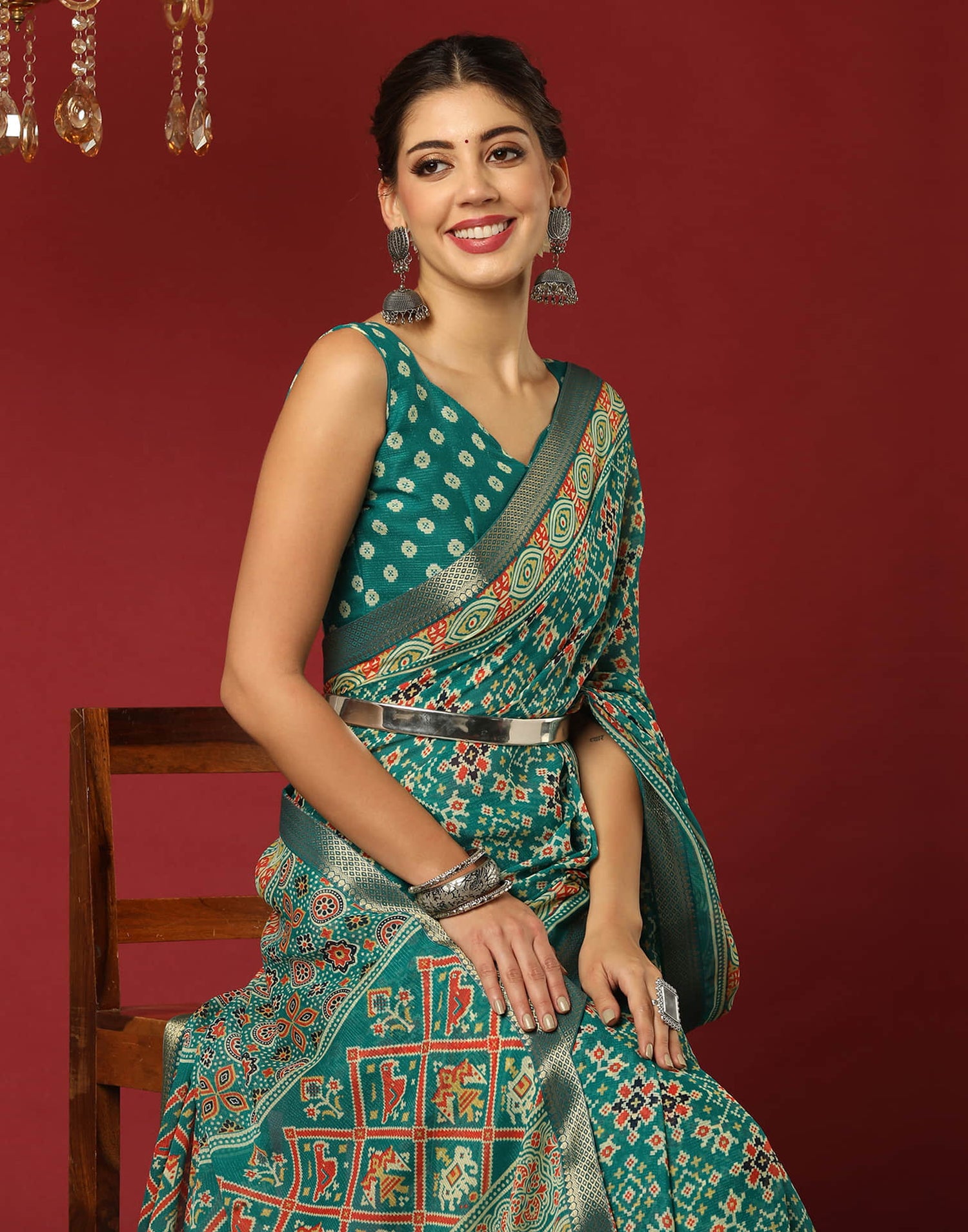 Teal Green Georgette Printed Patola Saree