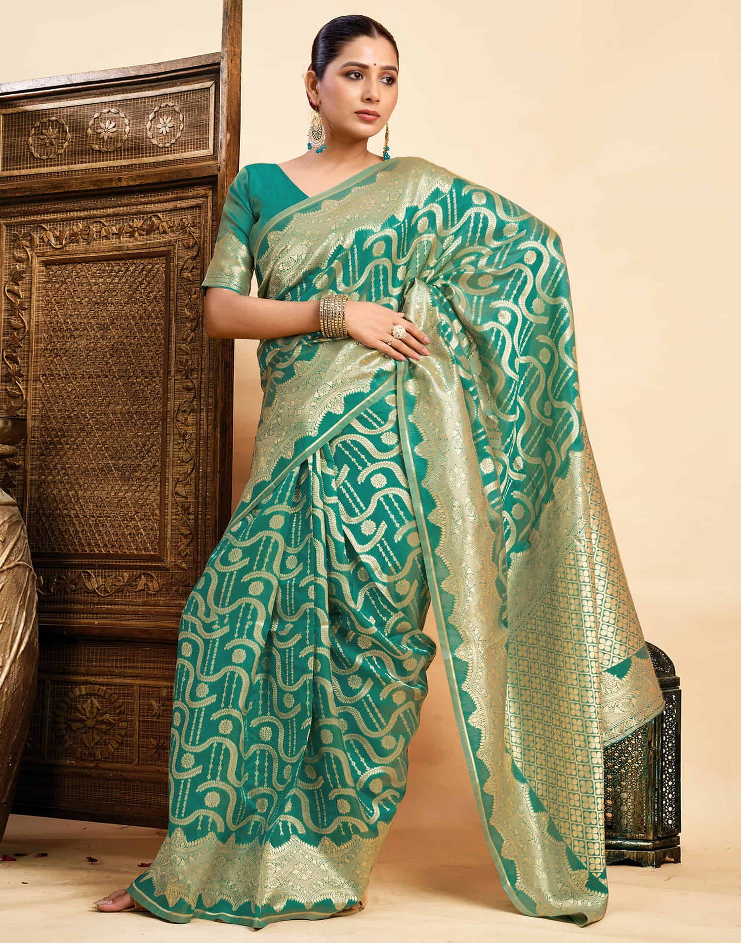 Teal Green Silk Woven Saree