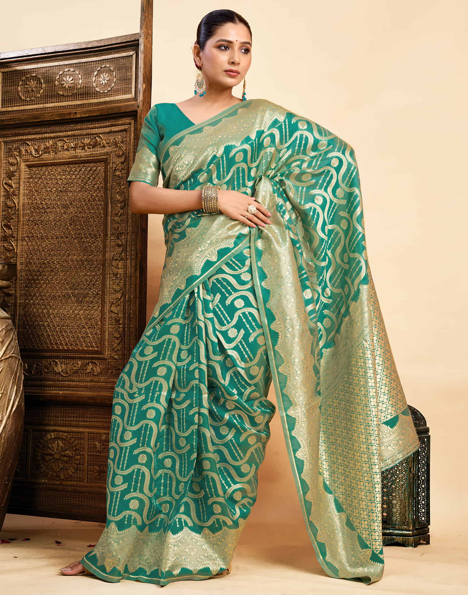 Teal Green Silk Woven Saree
