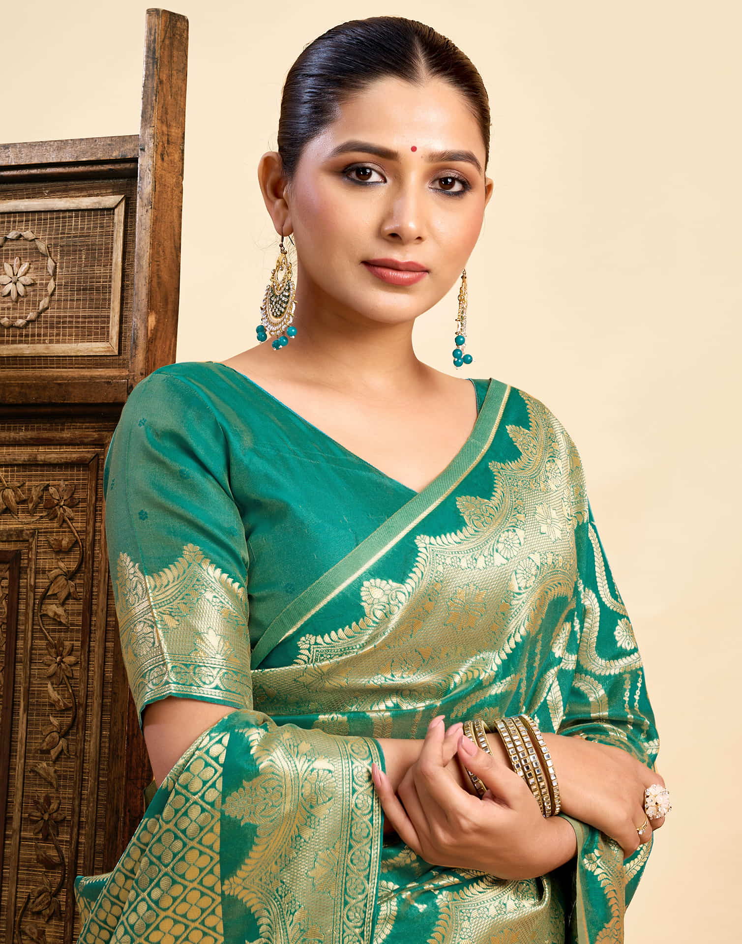 Teal Green Silk Woven Saree