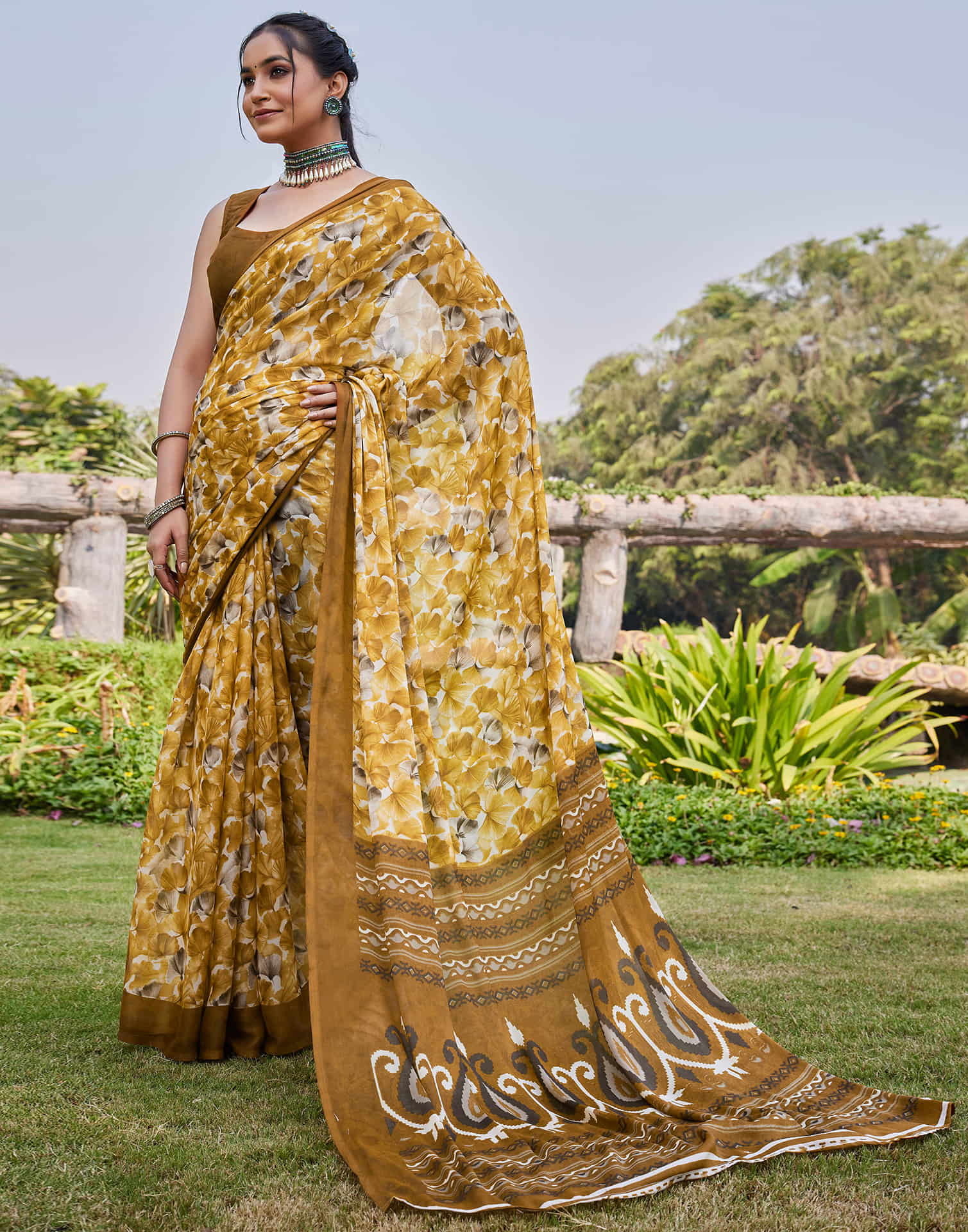 Turmeric Yellow Georgette Floral printed Saree