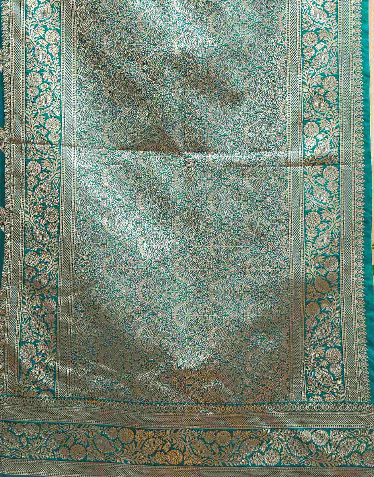 Teal Green Silk Woven Saree