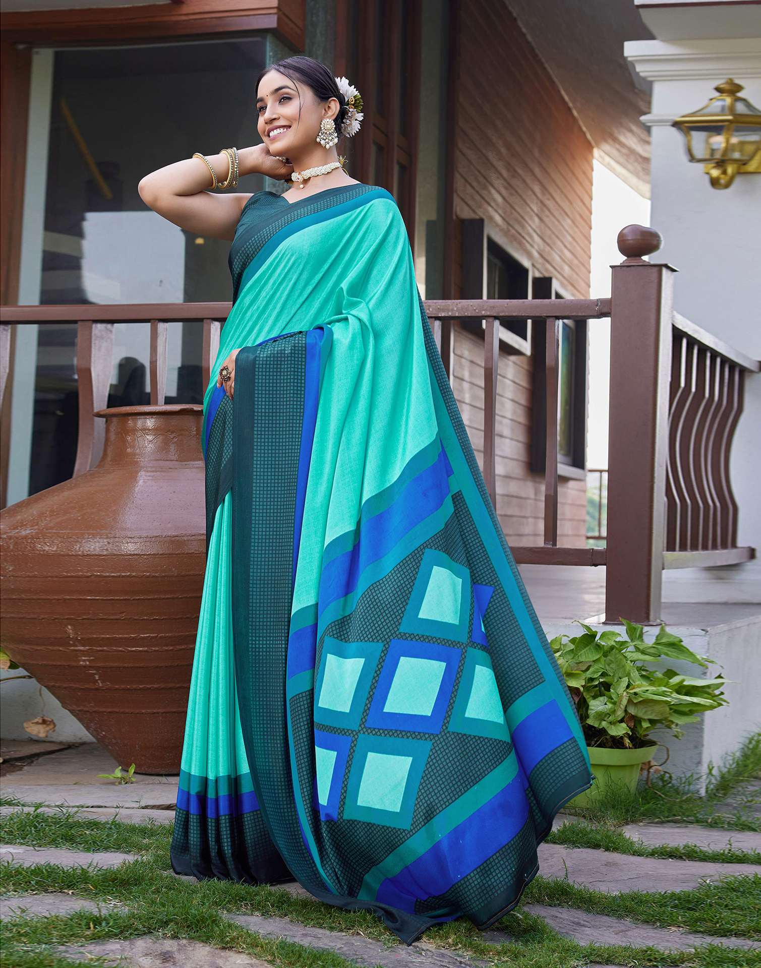 Turquoise Chinnon Printed Saree