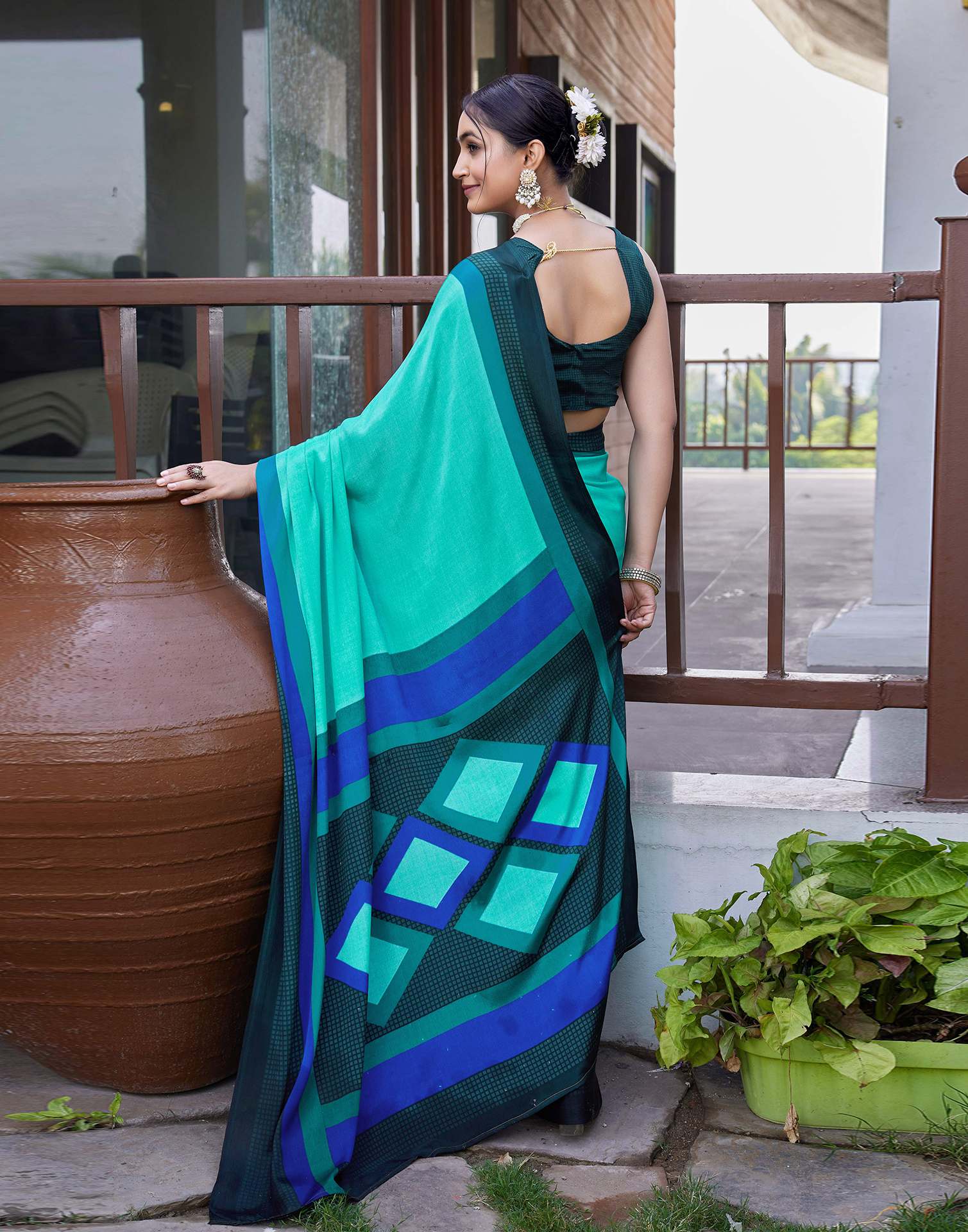 Turquoise Chinnon Printed Saree