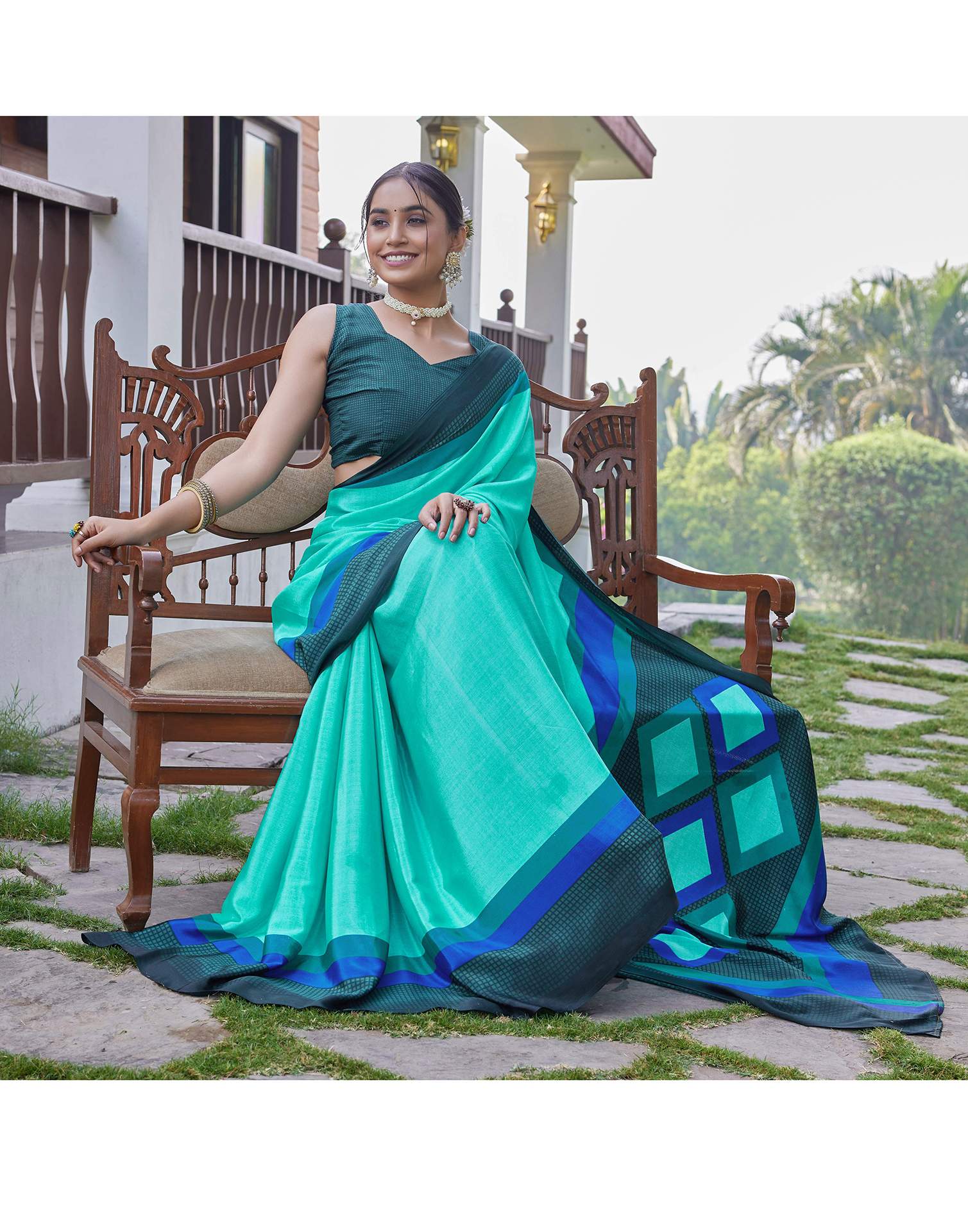 Turquoise Chinnon Printed Saree