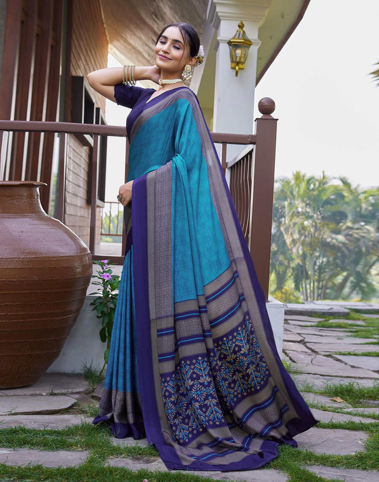 Teal Blue Chinnon Printed Saree