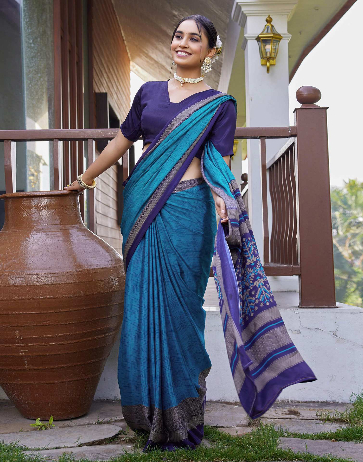 Teal Blue Chinnon Printed Saree