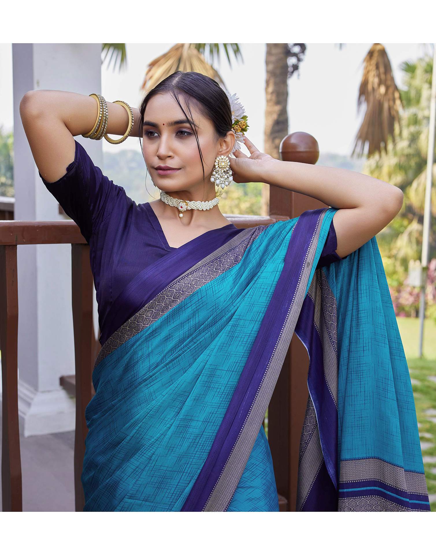 Teal Blue Chinnon Printed Saree
