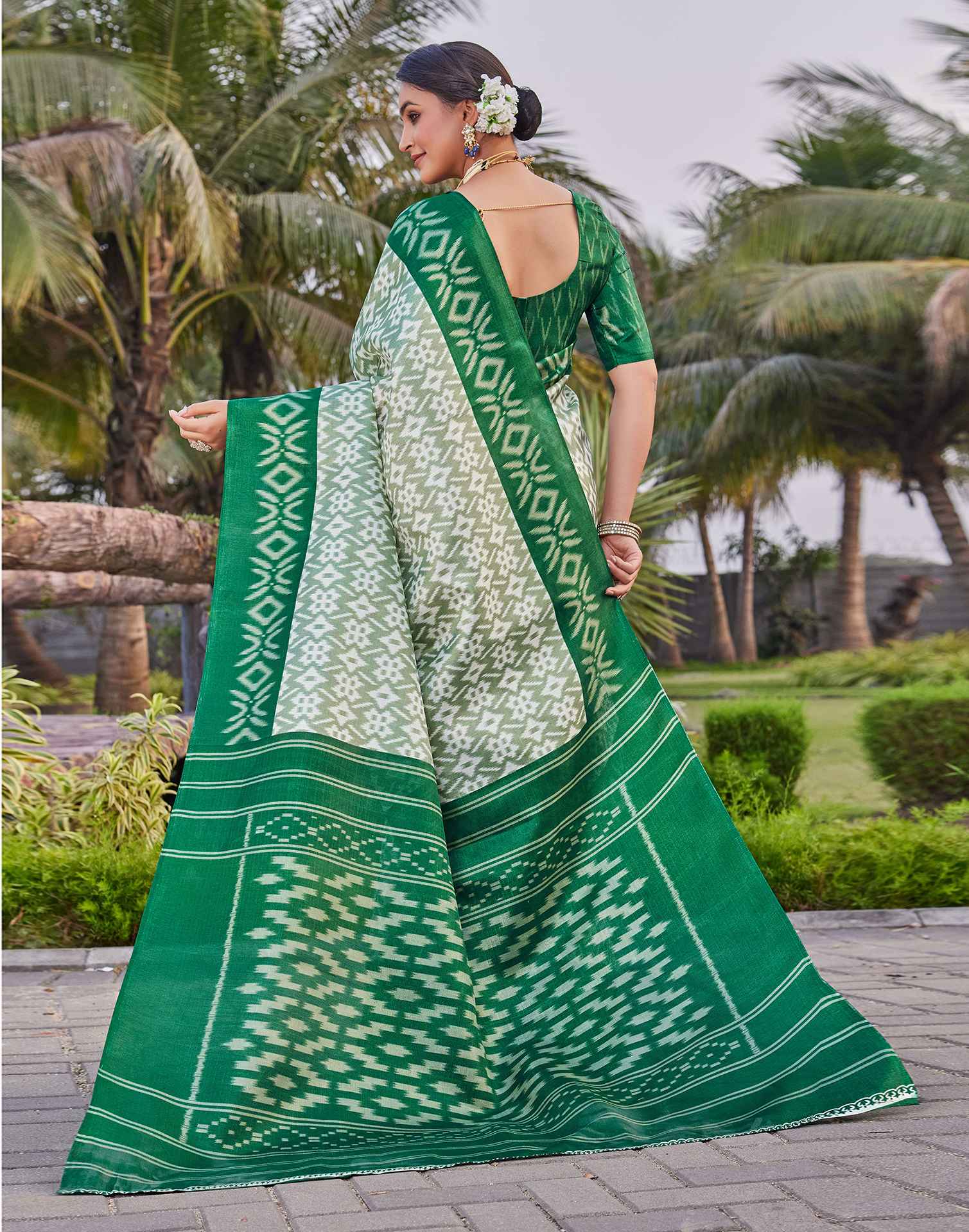 Green Cotton Blend Ikkat Printed Saree