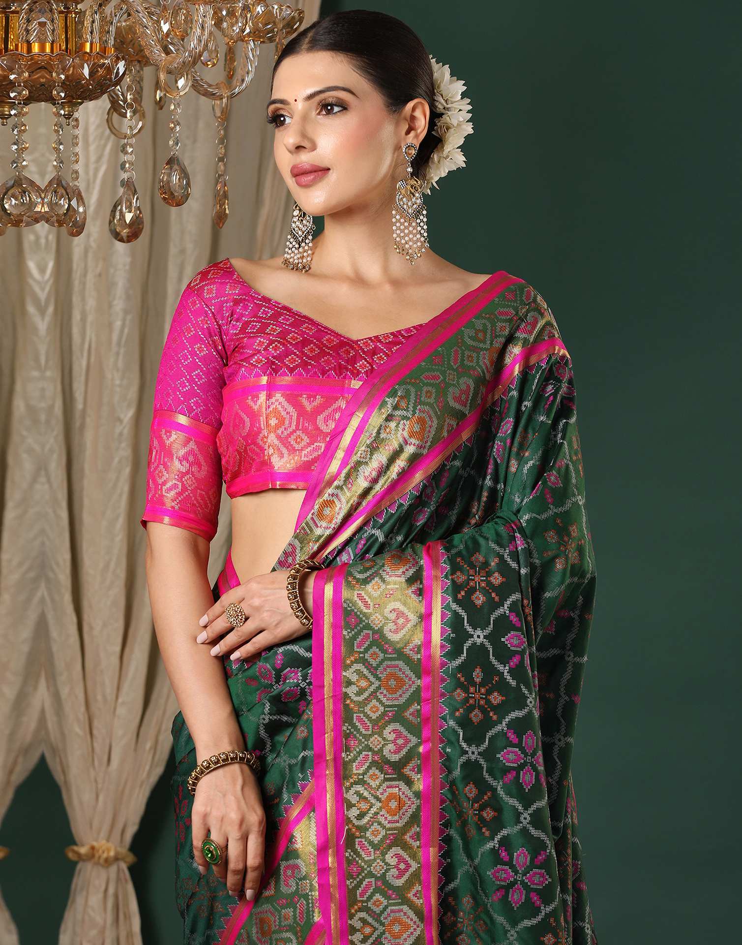 Dark Green Silk Patola Woven Saree