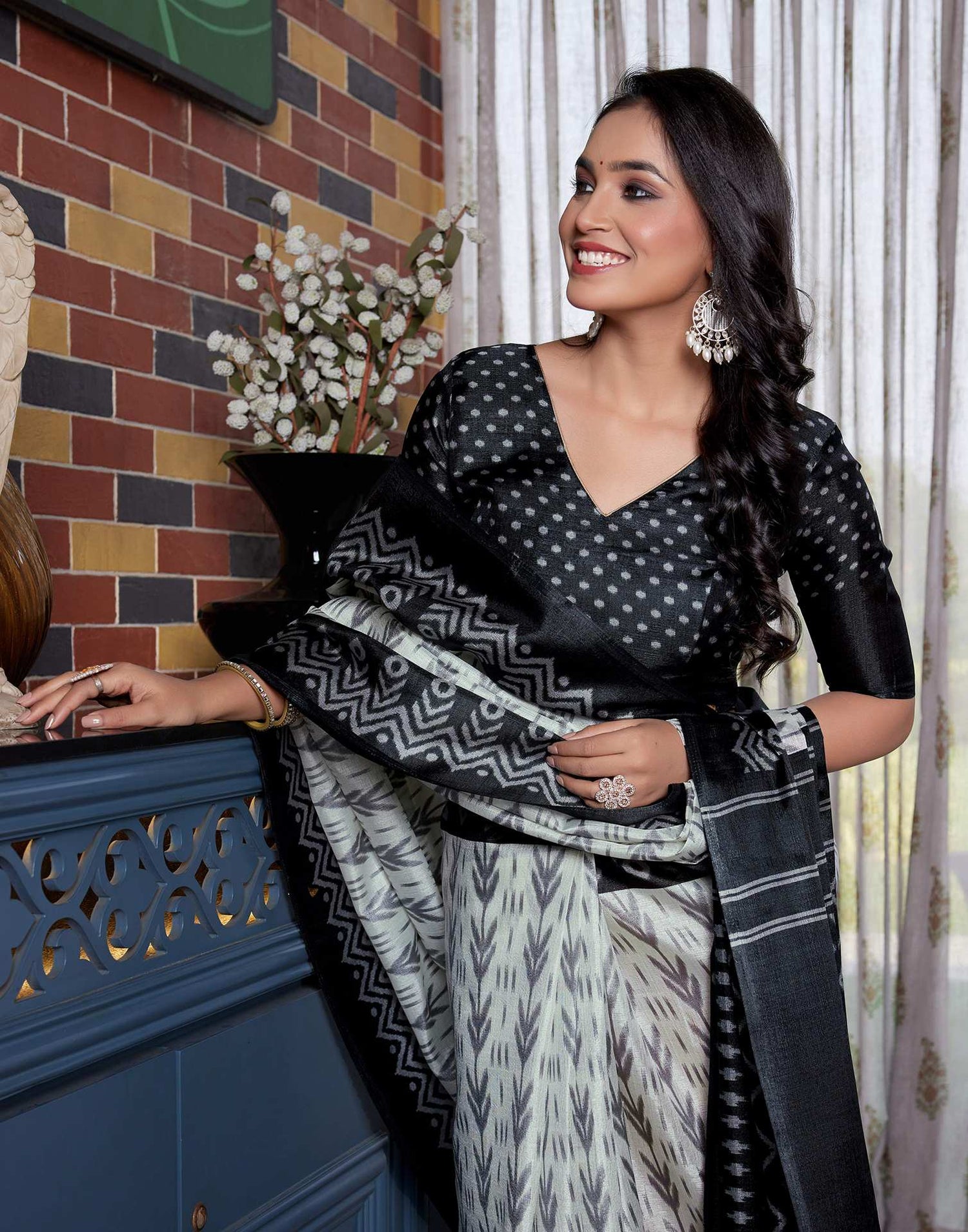Black Cotton Blend Ikkat Printed Saree