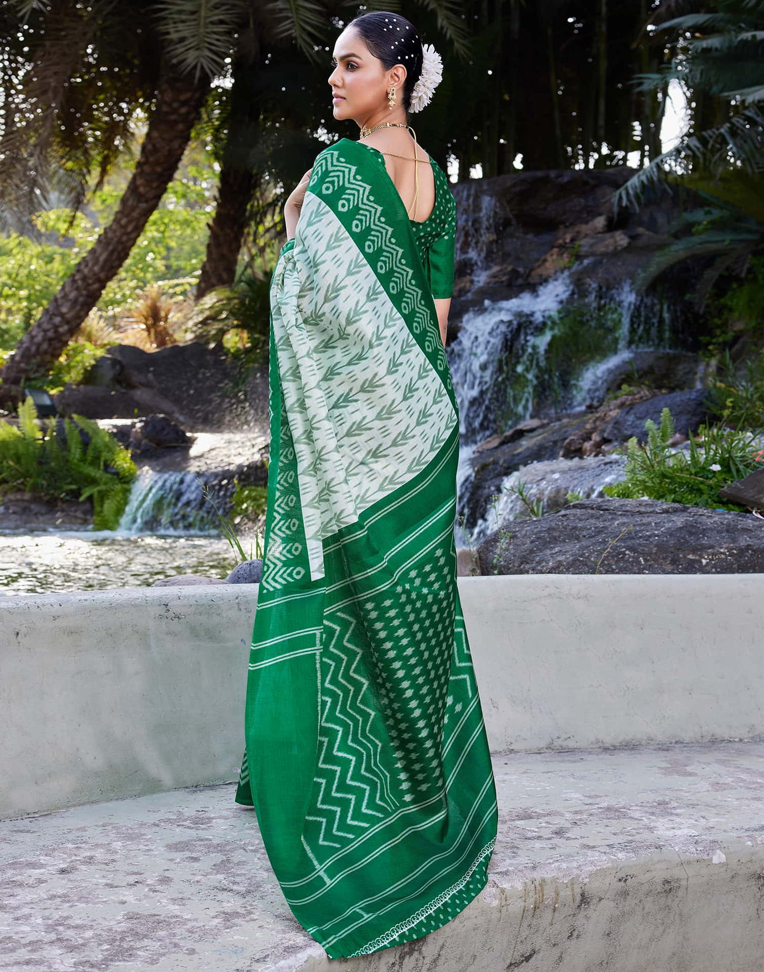 Dark Green Cotton Blend Ikkat Printed Saree