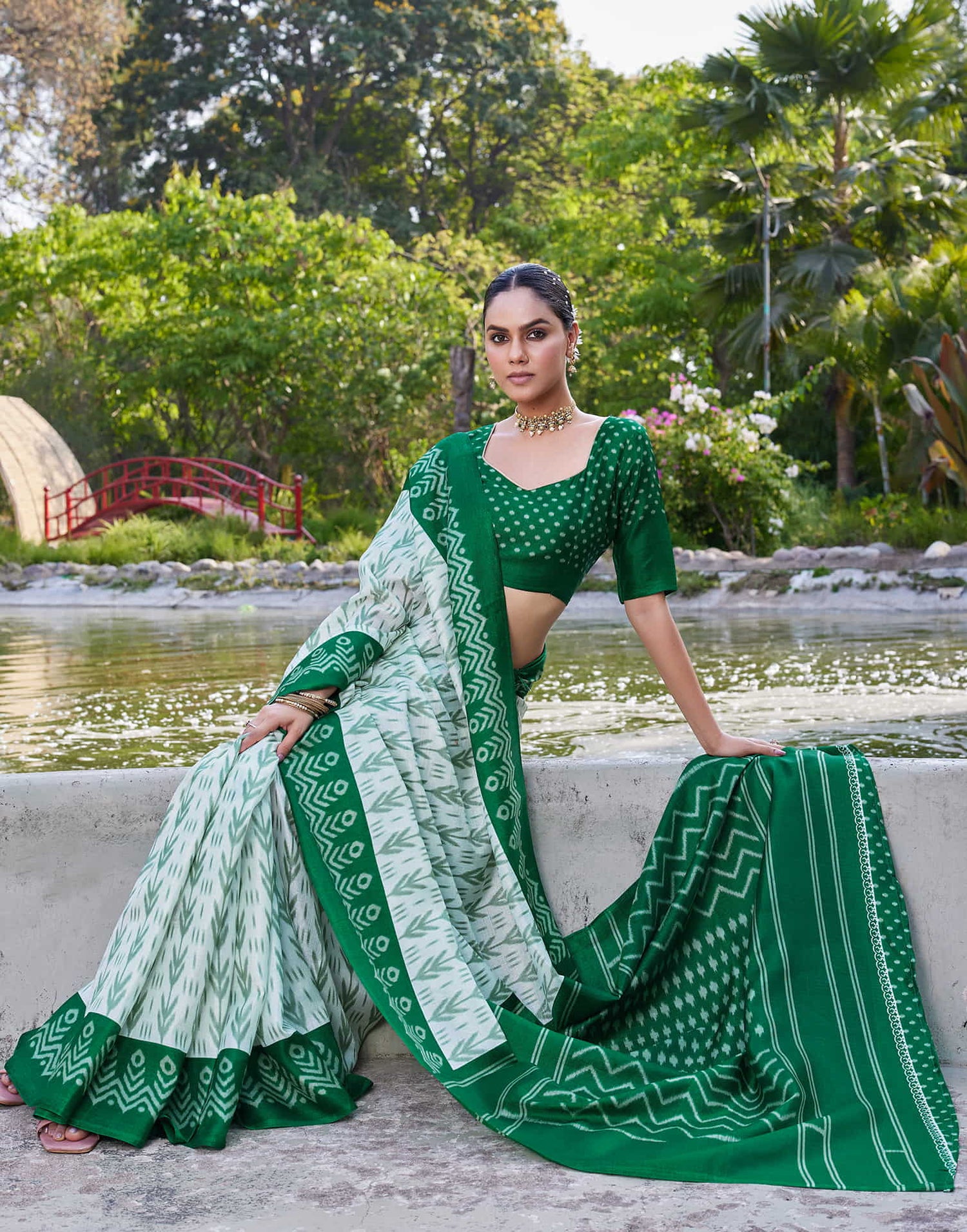 Dark Green Cotton Blend Ikkat Printed Saree