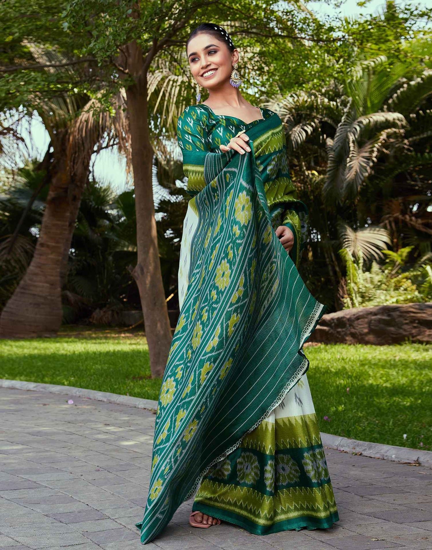 Dark Green Cotton Blend Ikkat Printed Saree