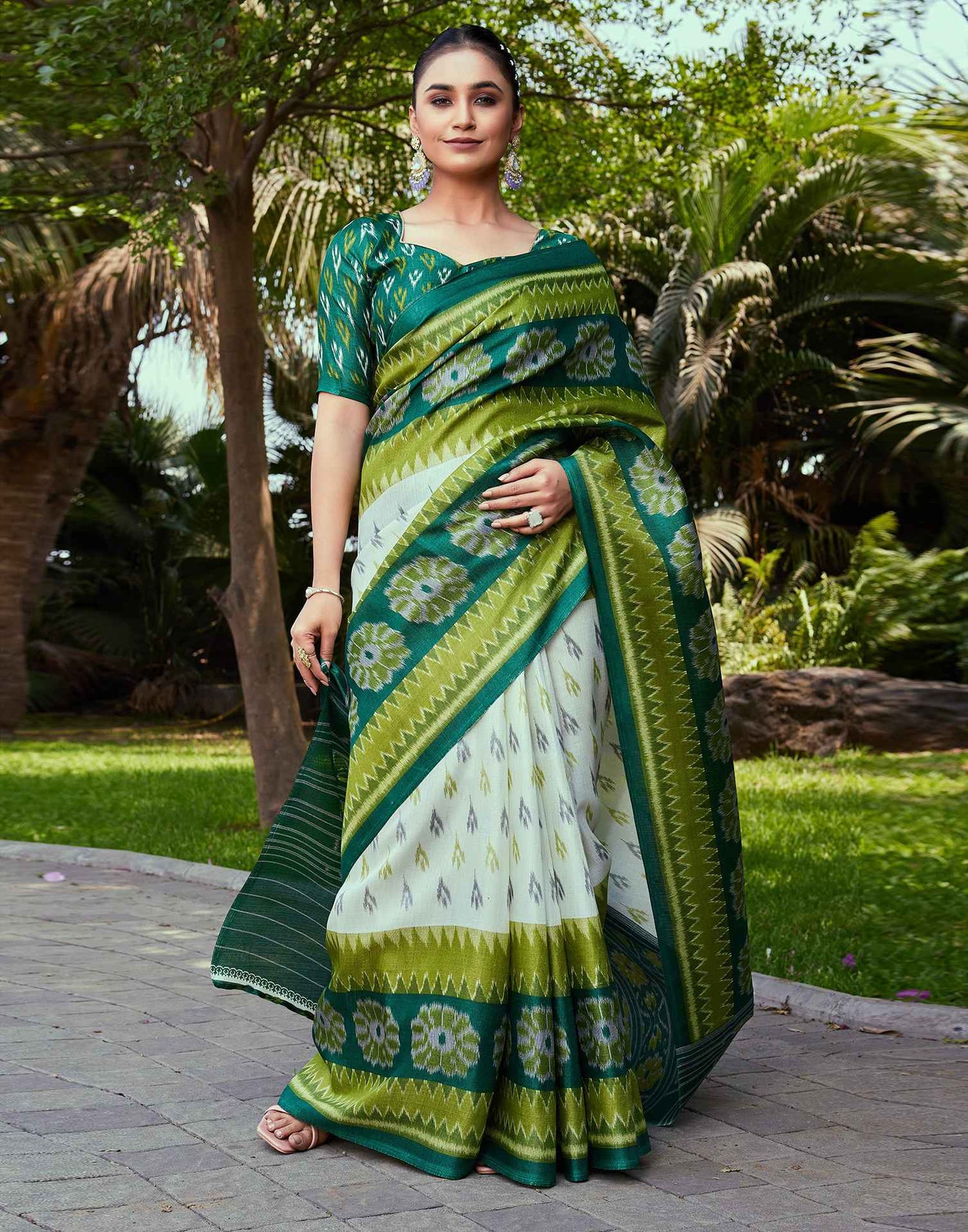 Dark Green Cotton Blend Ikkat Printed Saree
