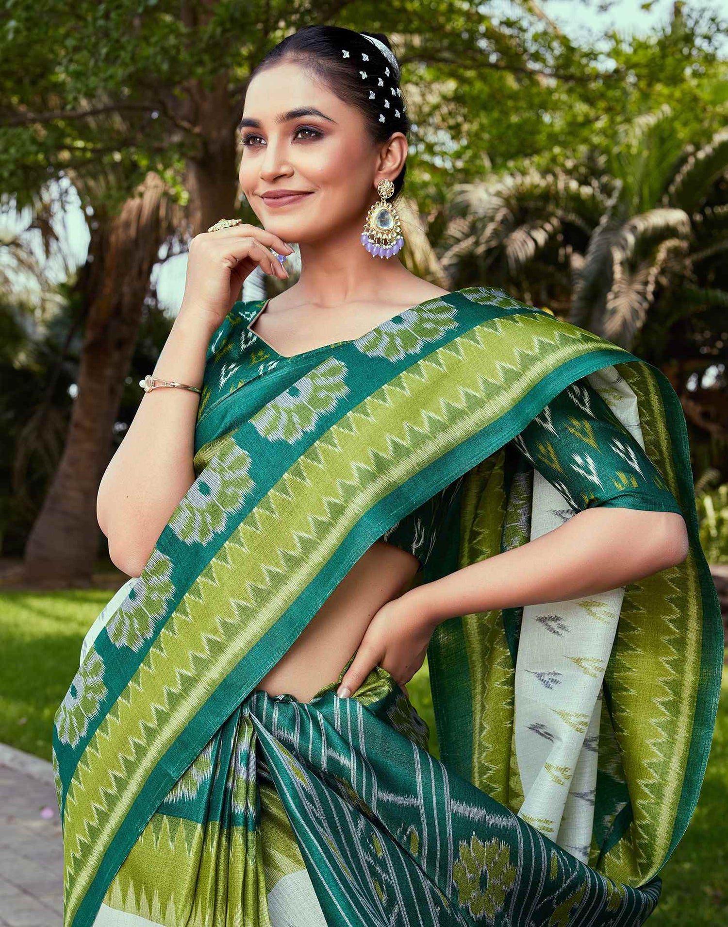 Dark Green Cotton Blend Ikkat Printed Saree
