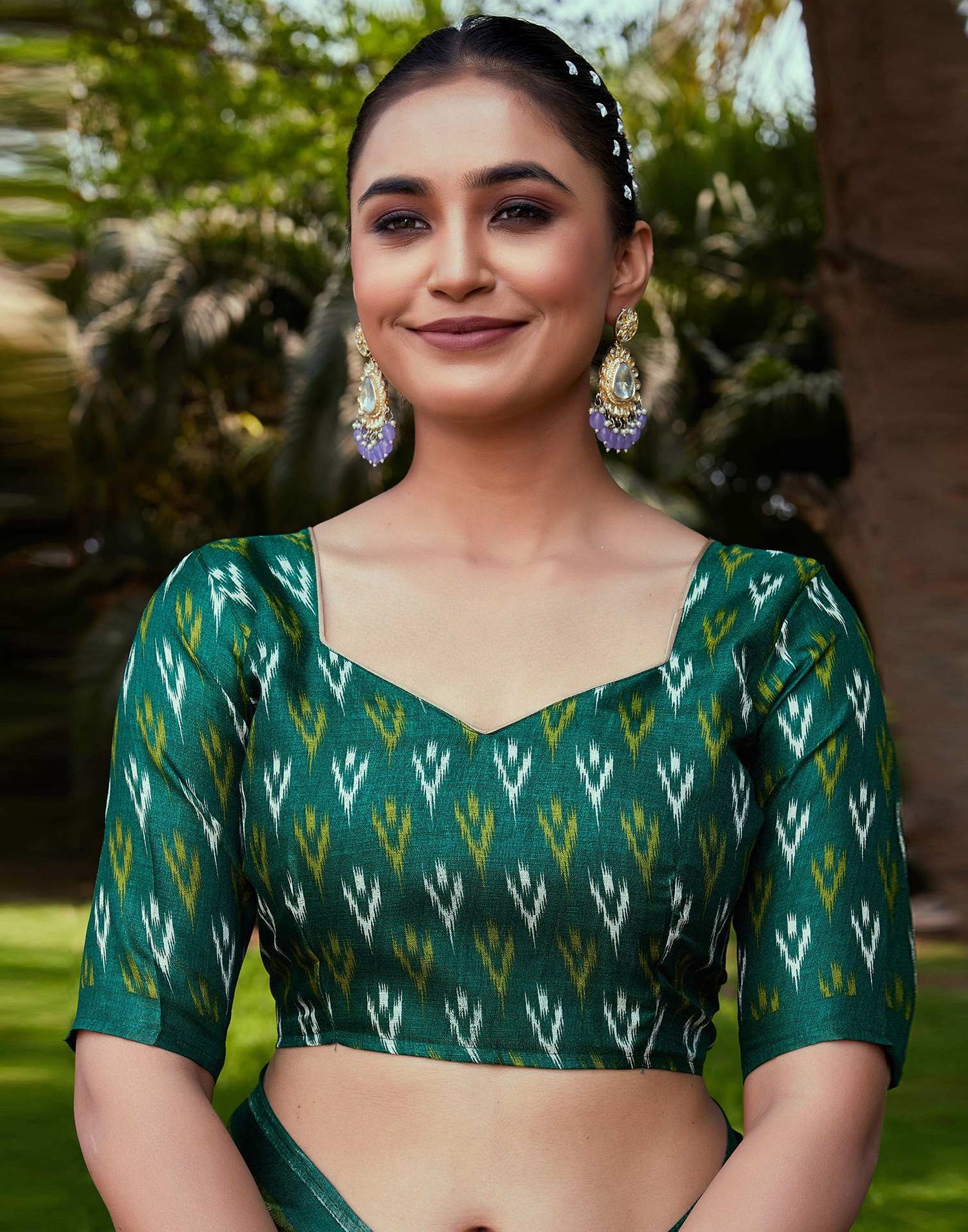 Dark Green Cotton Blend Ikkat Printed Saree