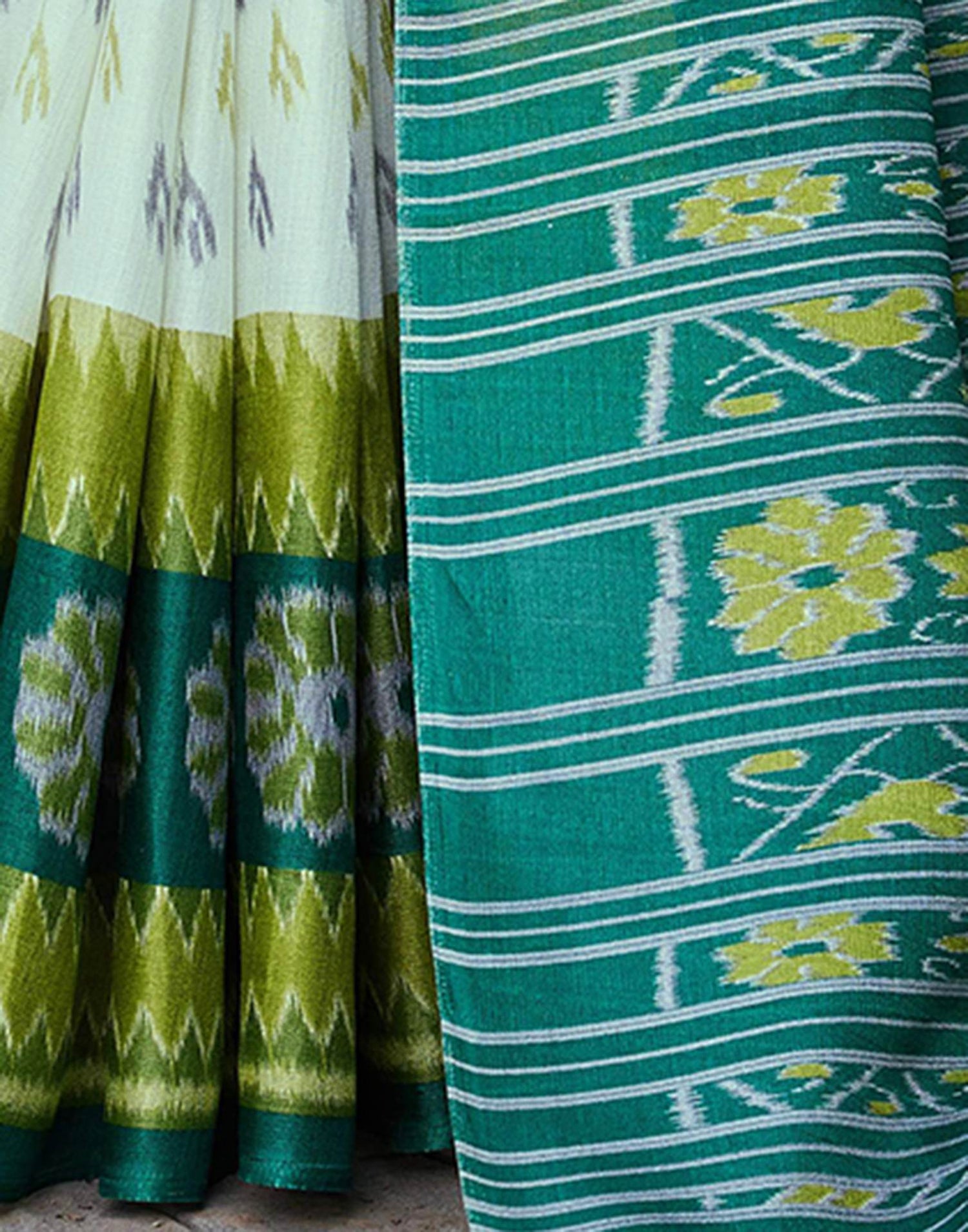 Dark Green Cotton Blend Ikkat Printed Saree