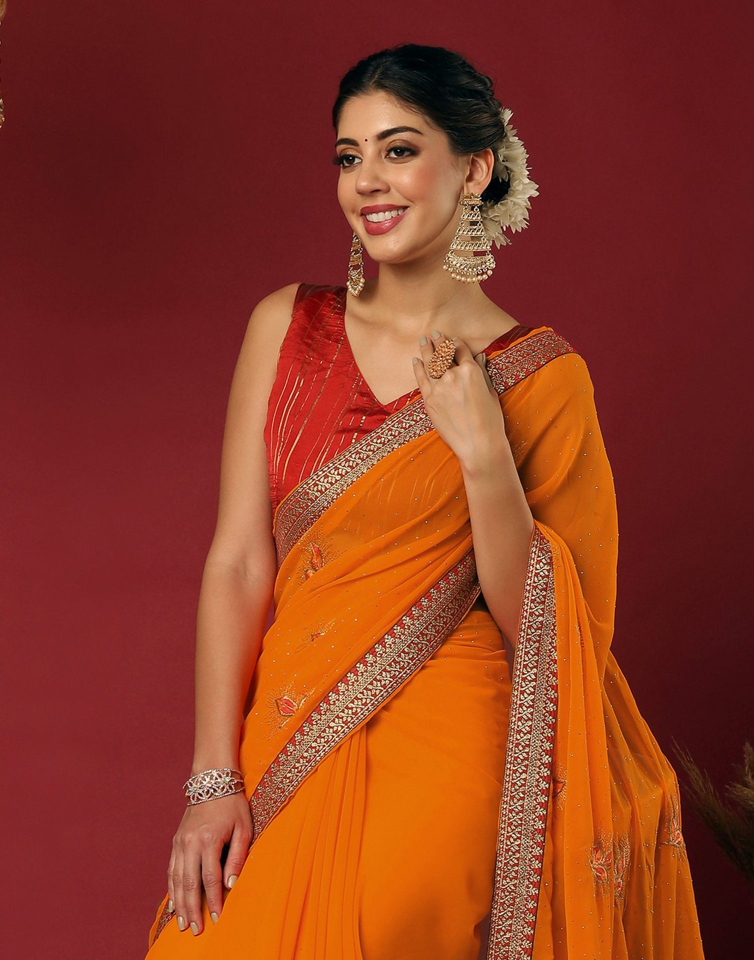 Orange Georgette Stone Work Swarovski Saree