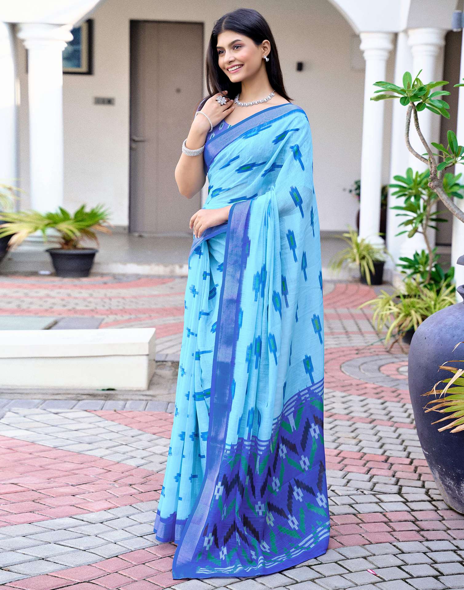 Sky Blue Linen Ikkat Printed Saree