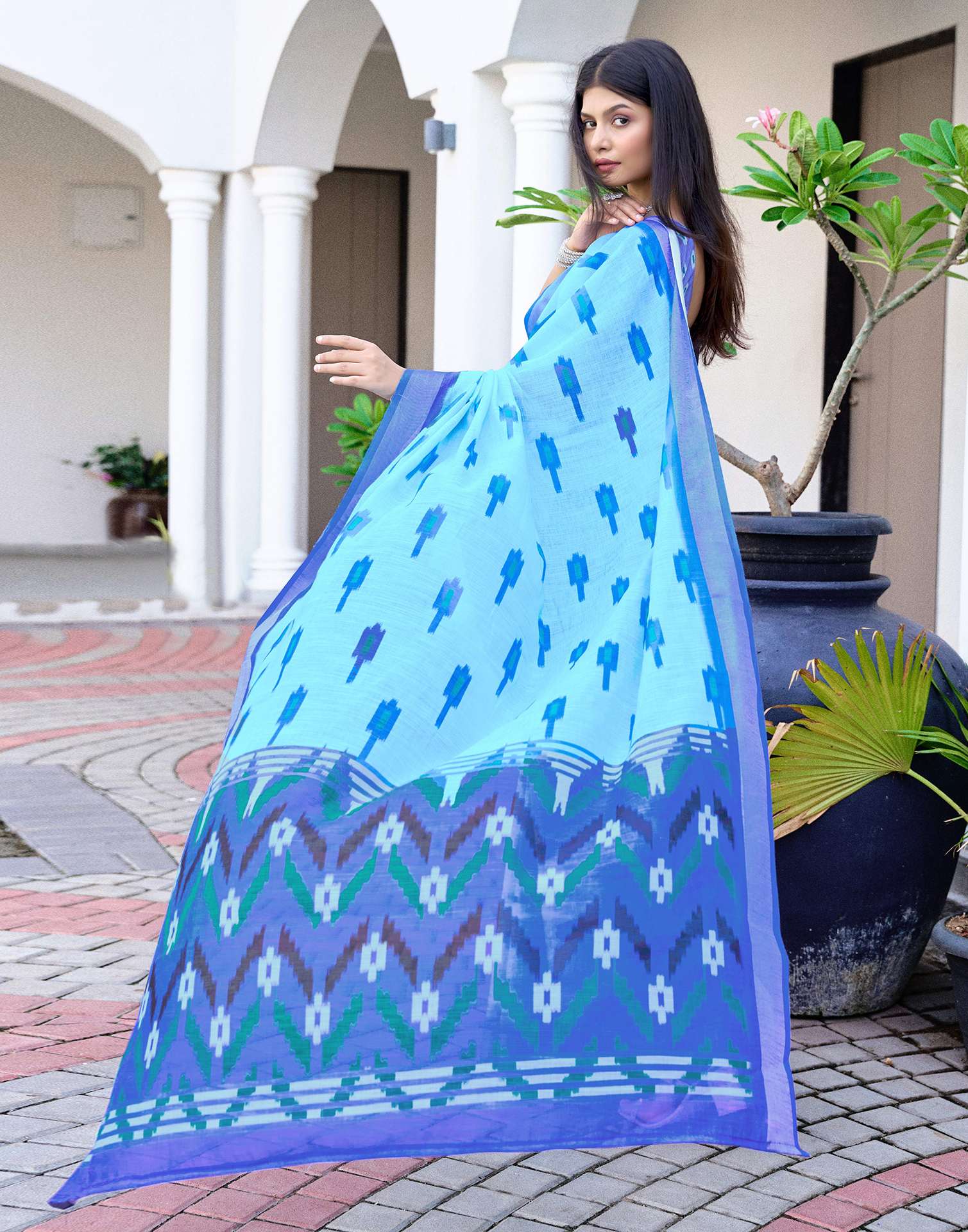 Sky Blue Linen Ikkat Printed Saree