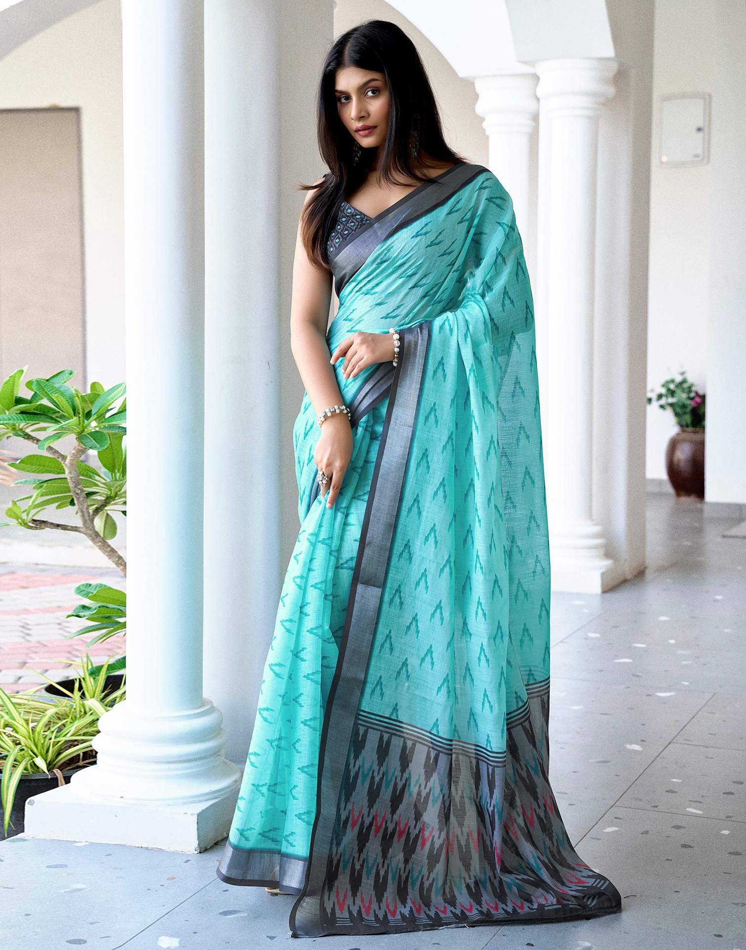 Turquoise Linen Ikkat Printed Saree