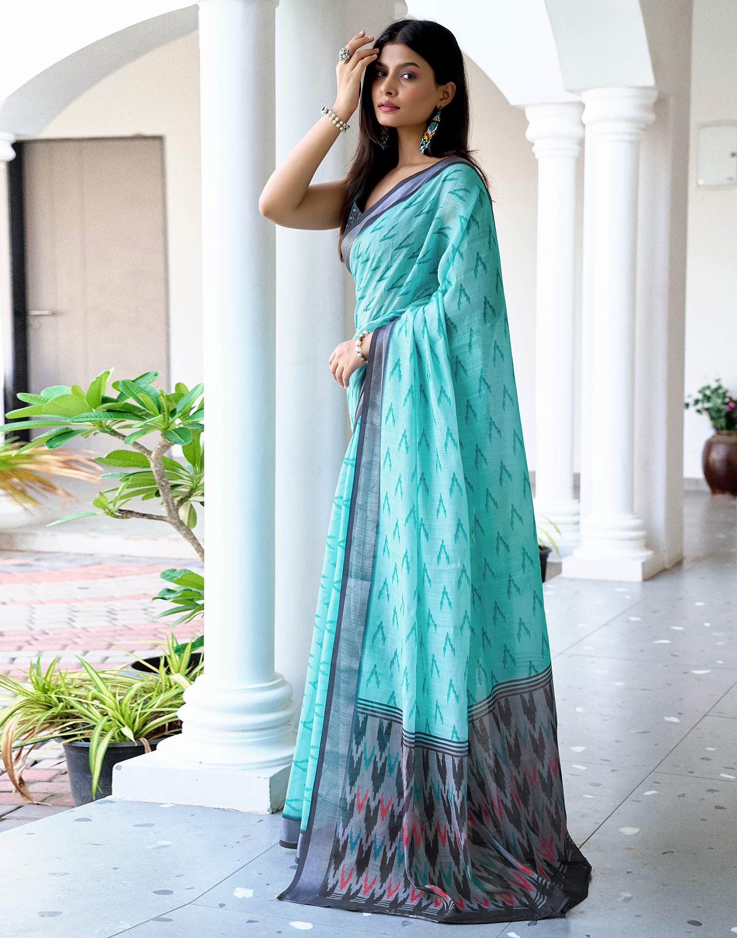 Turquoise Linen Ikkat Printed Saree