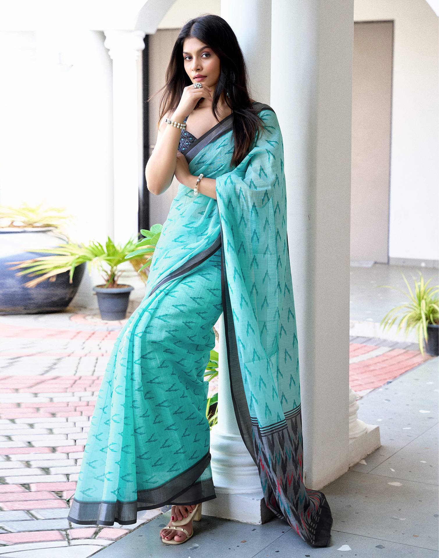 Turquoise Linen Ikkat Printed Saree