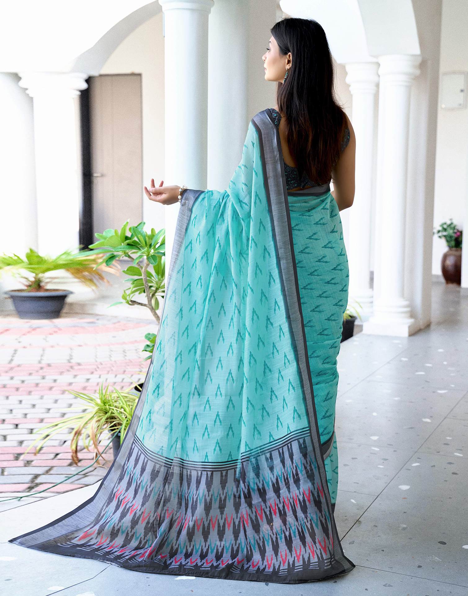 Turquoise Linen Ikkat Printed Saree