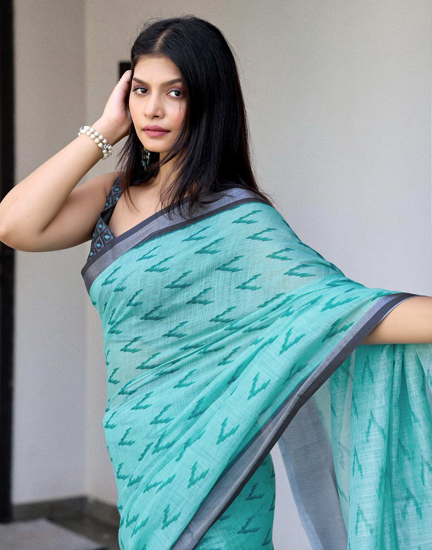 Turquoise Linen Ikkat Printed Saree