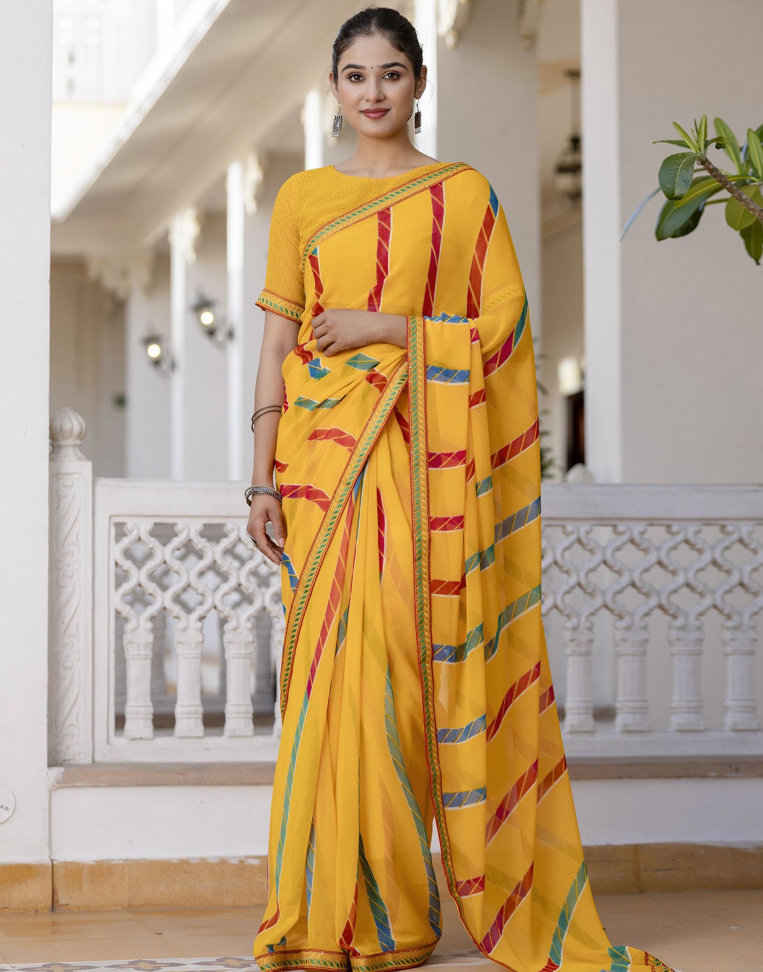 Yellow Georgette printed Saree
